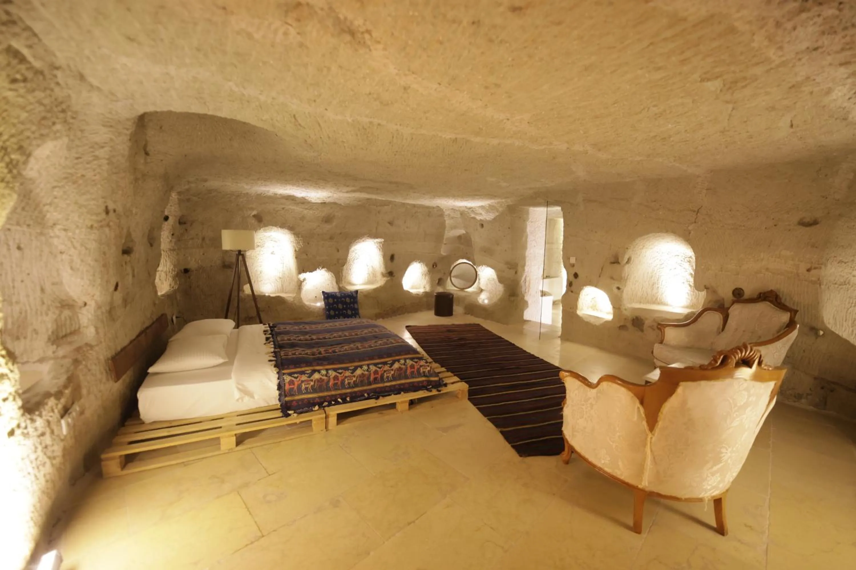 Bedroom in My Cave Suites