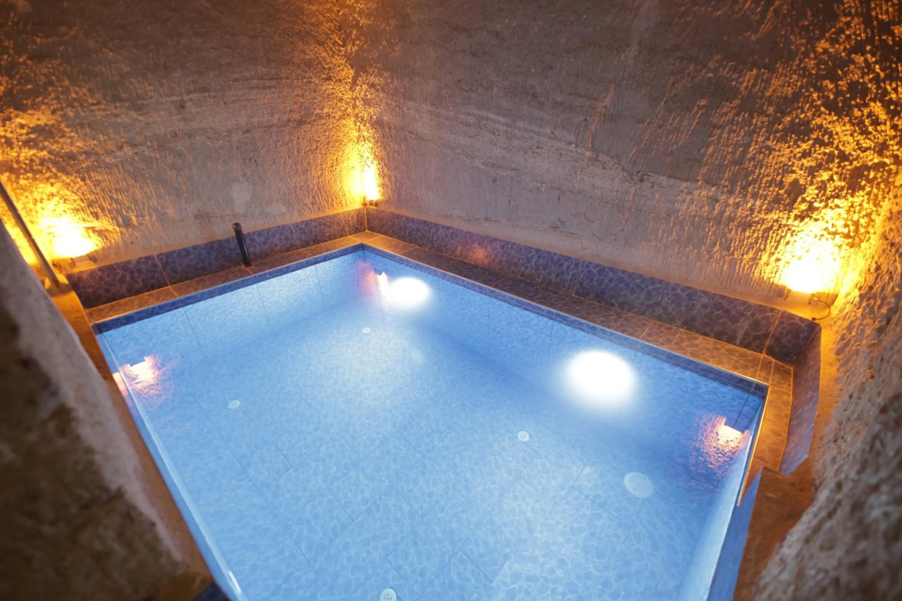 Swimming pool in My Cave Suites