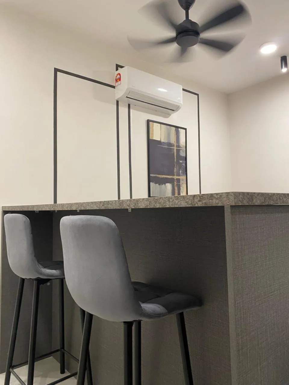 Seating area in Neu Suites @ 3rdNvenue by Perfect Host