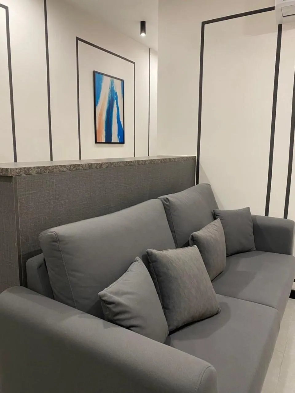 Living room in Neu Suites @ 3rdNvenue by Perfect Host