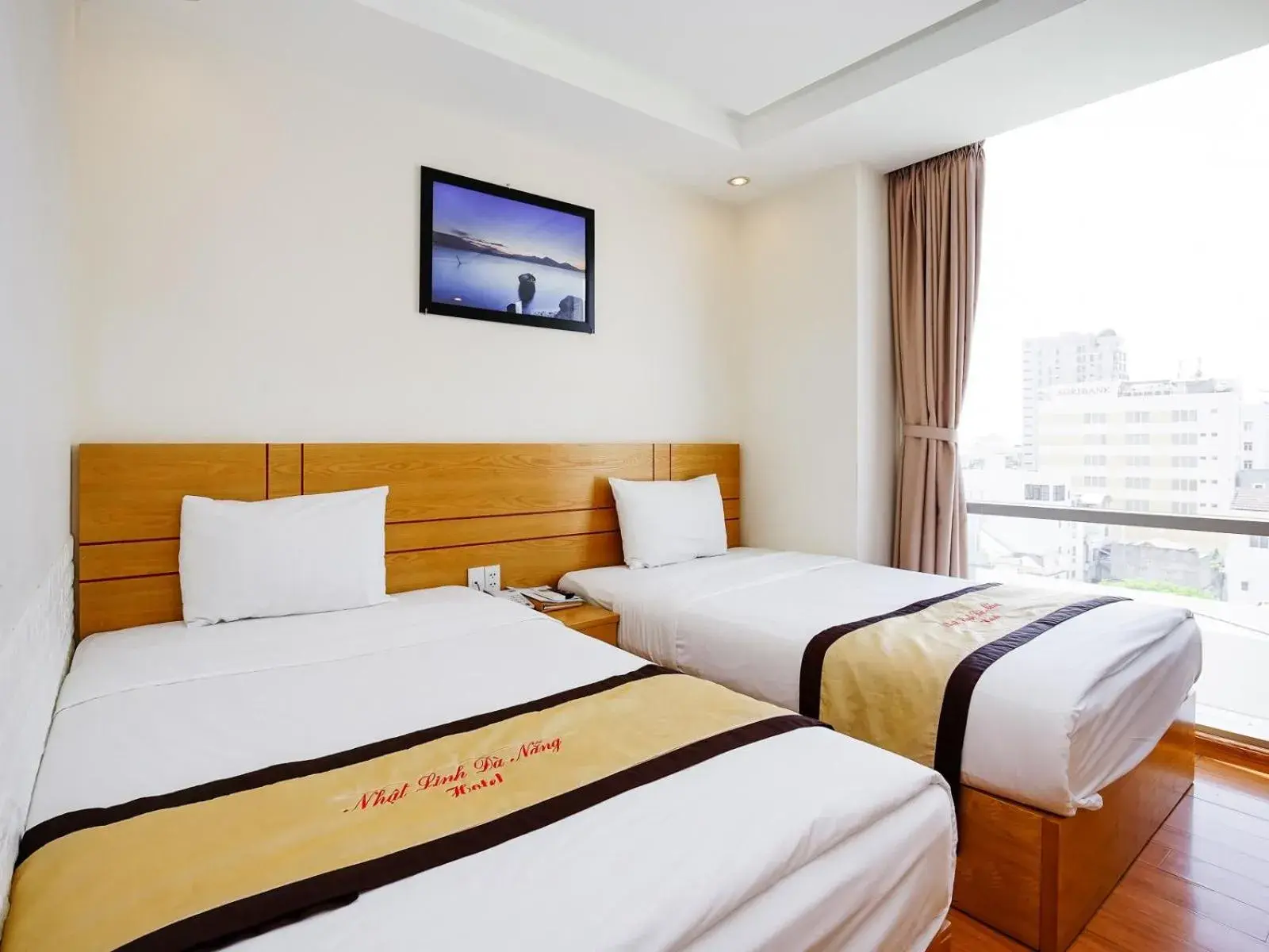 Bed in Nhat Linh Hotel & Suites Da Nang Bed in Nhat Linh Hotel & Suites Da Nang