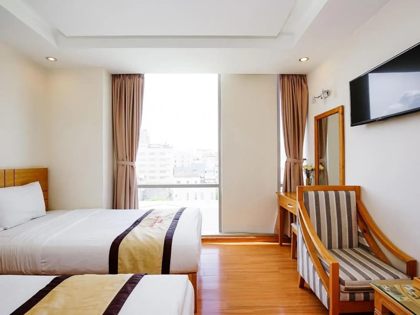Bed in Nhat Linh Hotel & Suites Da Nang Bed in Nhat Linh Hotel & Suites Da Nang