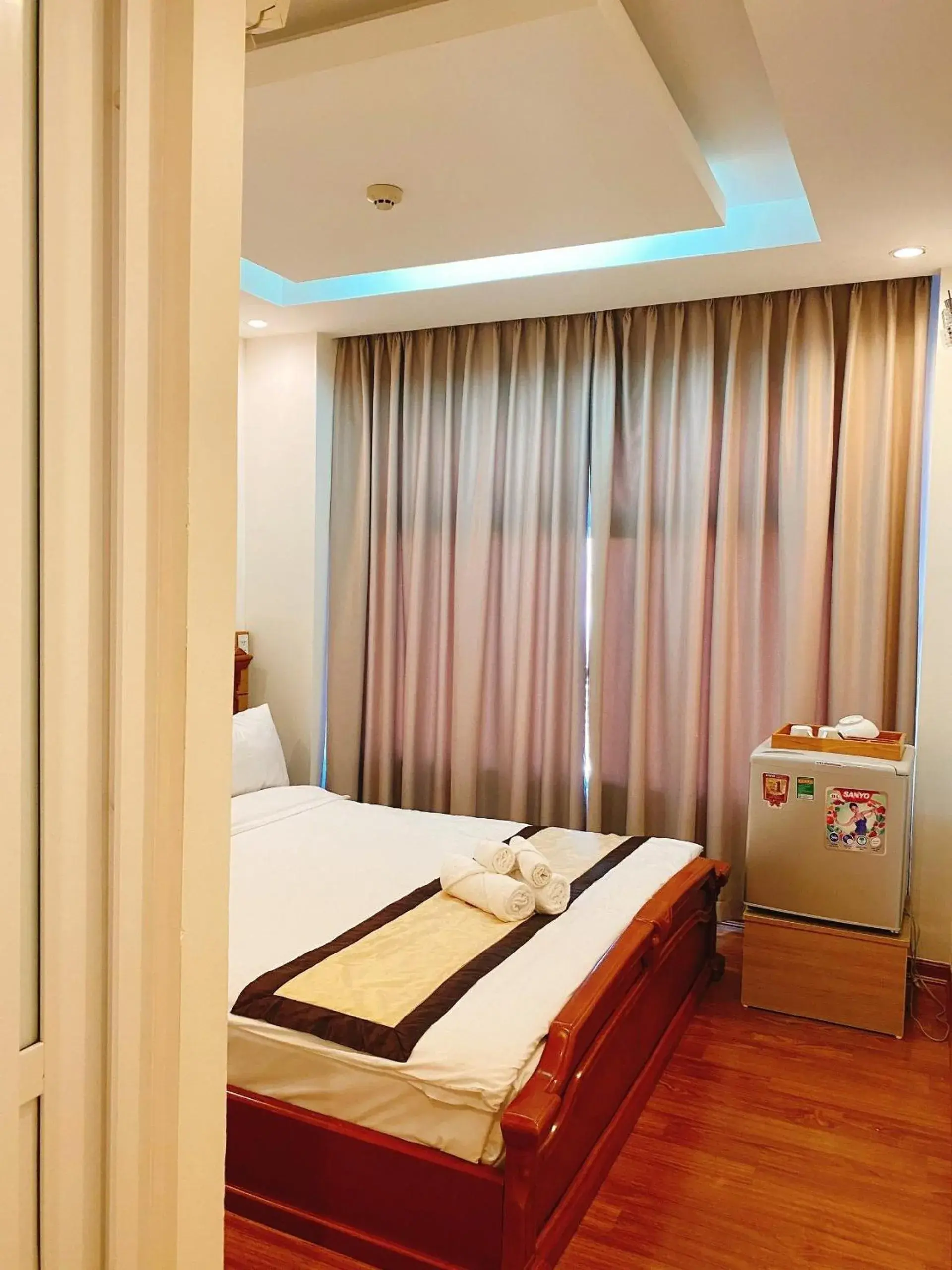 Bed in Nhat Linh Hotel & Suites Da Nang Bed in Nhat Linh Hotel & Suites Da Nang