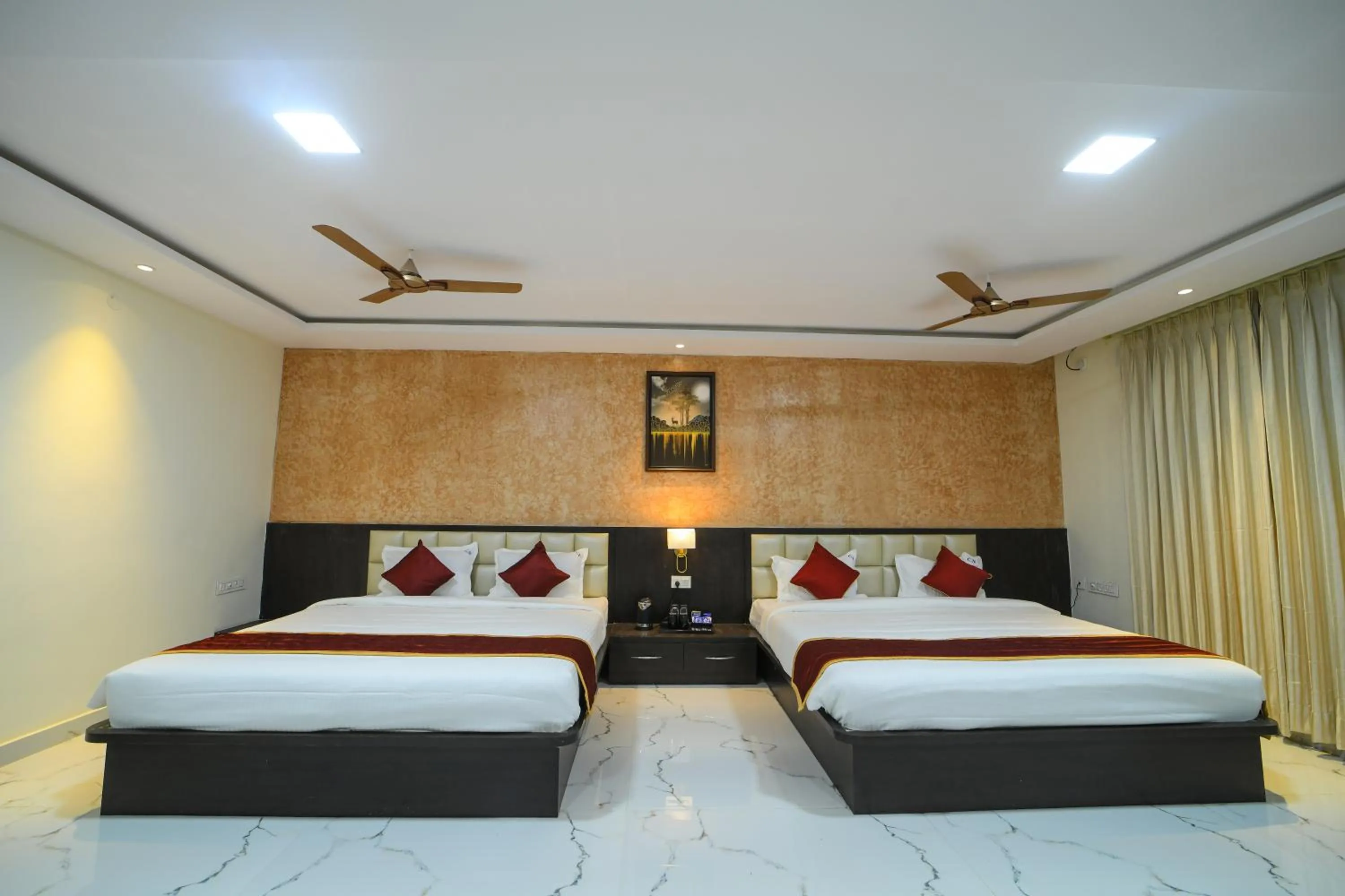 Bed in Hotel CN Windsor Chikmagaluru