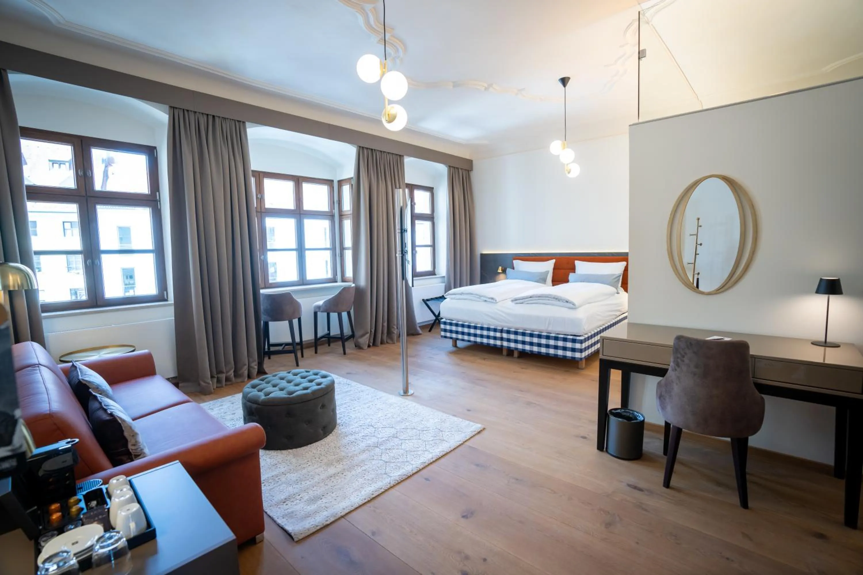 Photo of the whole room, Bed in Maxim Suites by Elias Holl