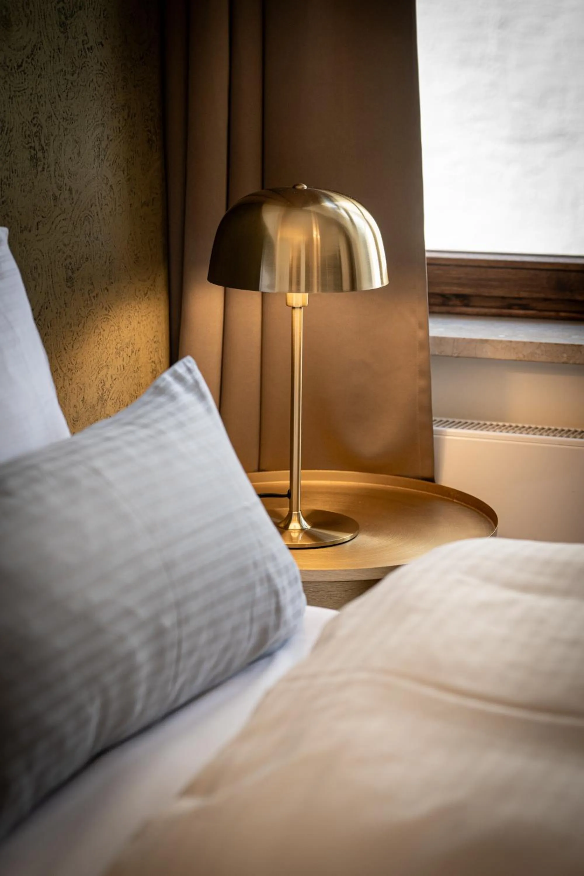 Bed in Maxim Suites by Elias Holl