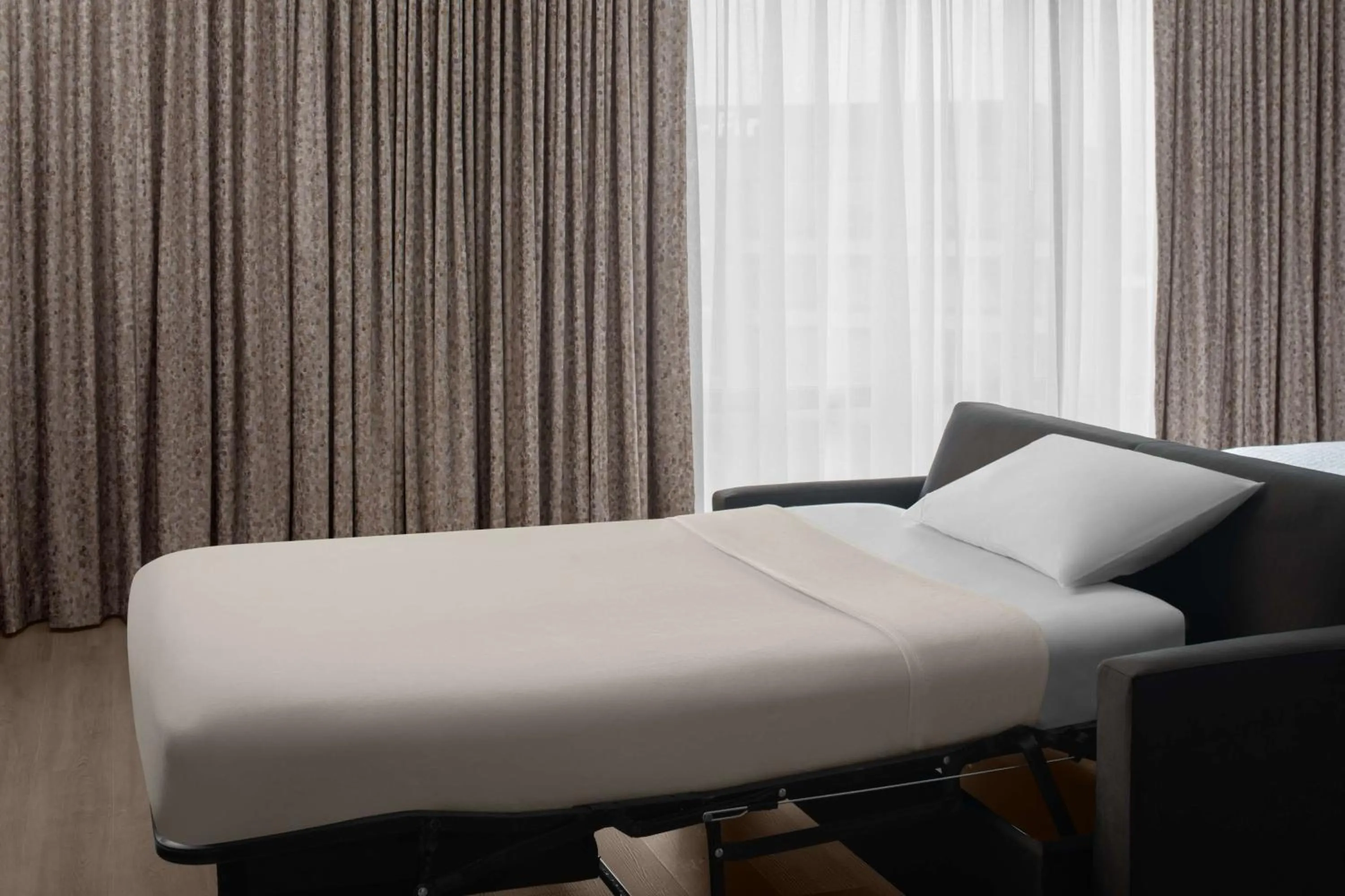 Living room, Bed in Homewood Suites By Hilton Grand Prairie At EpicCentral