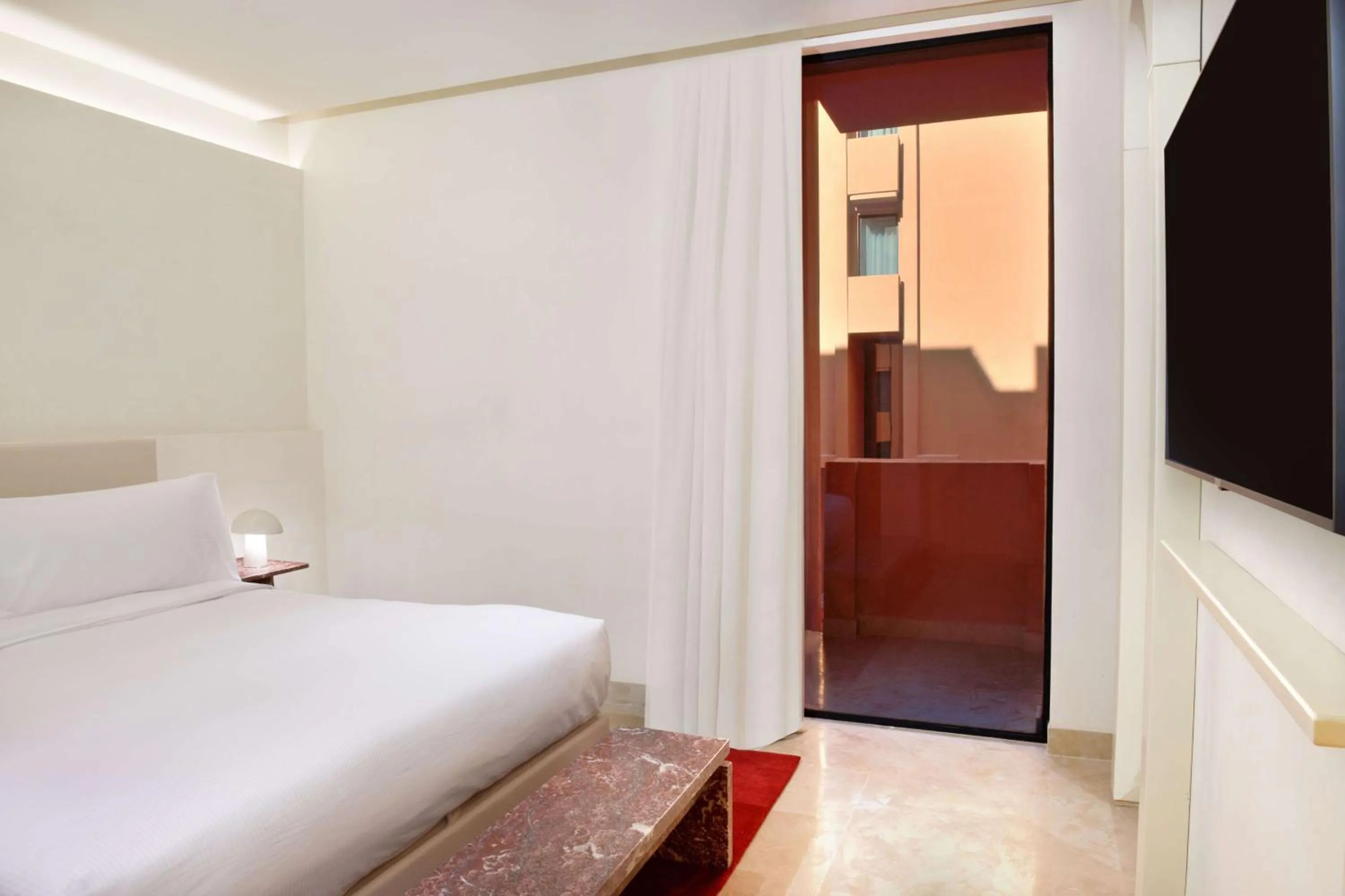 Bed in Doubletree By Hilton Ben Guerir Hotel & Residences