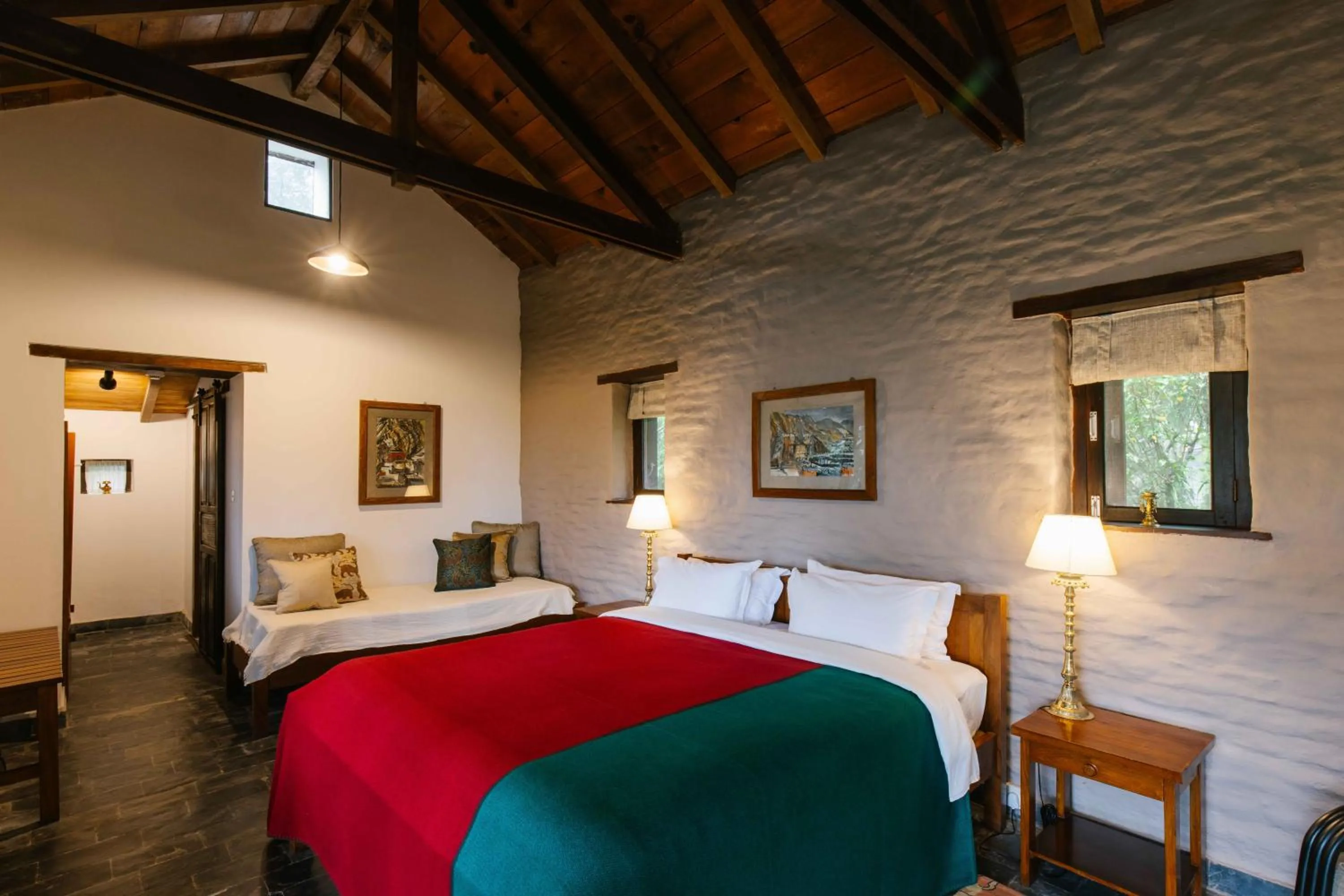 Bed in Tiger Mountain Pokhara Lodge