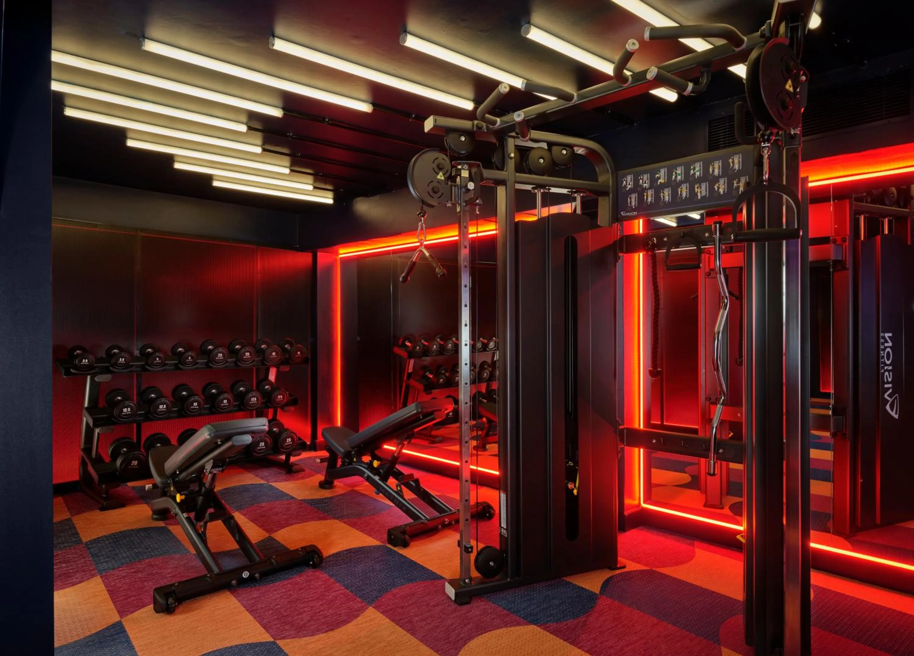 Fitness centre/facilities in The Cura Hotel Kensington, London, a Tribute Portfolio Hotel