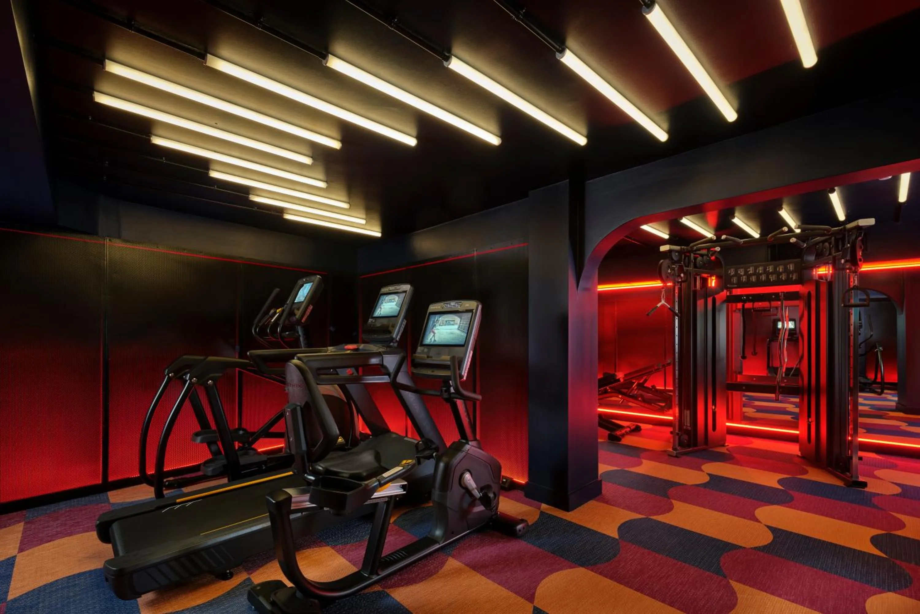 Fitness centre/facilities in The Cura Hotel Kensington, London, a Tribute Portfolio Hotel