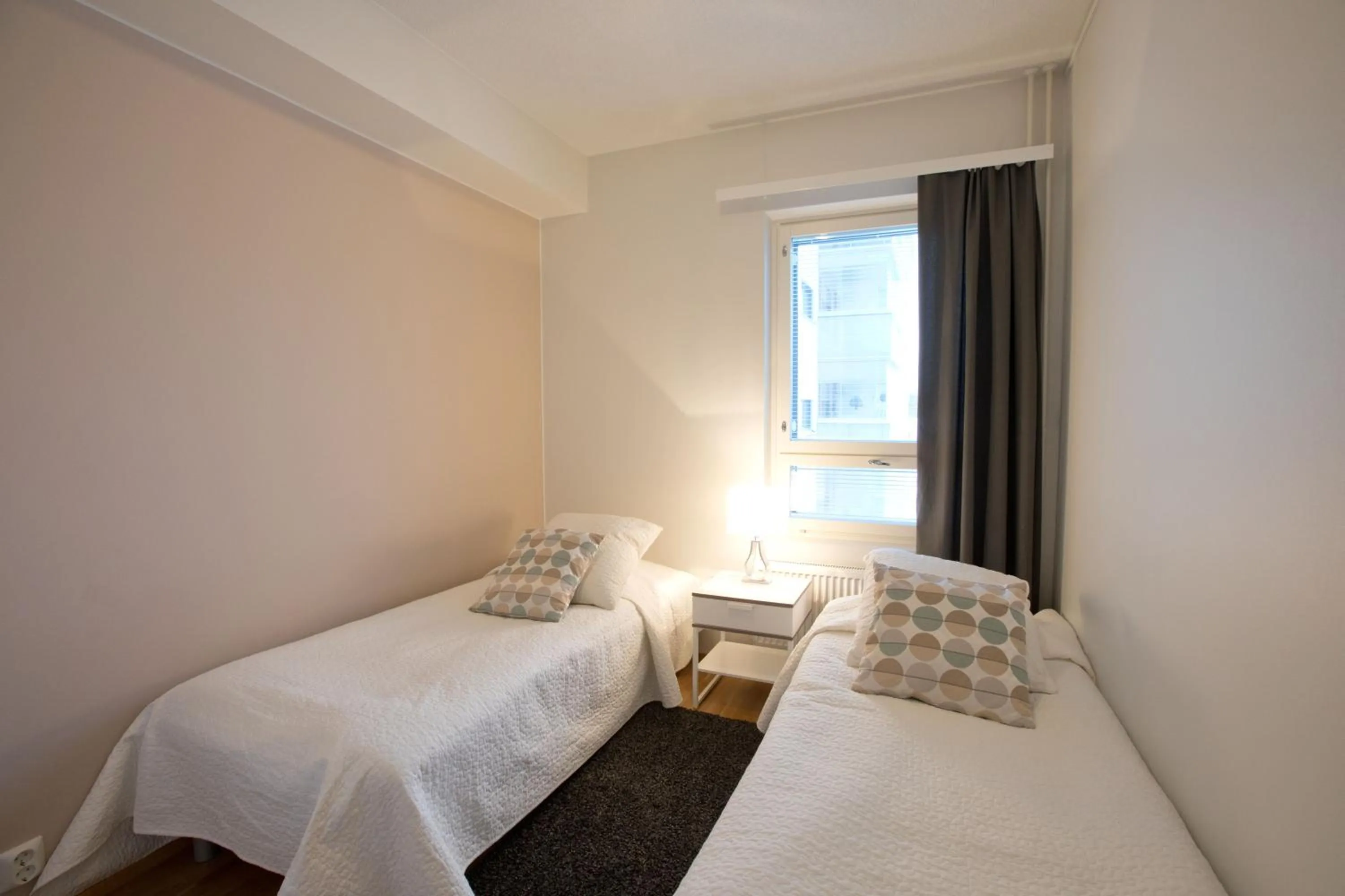 Bedroom, Bed in Kotimaailma Apartments Rovaniemi