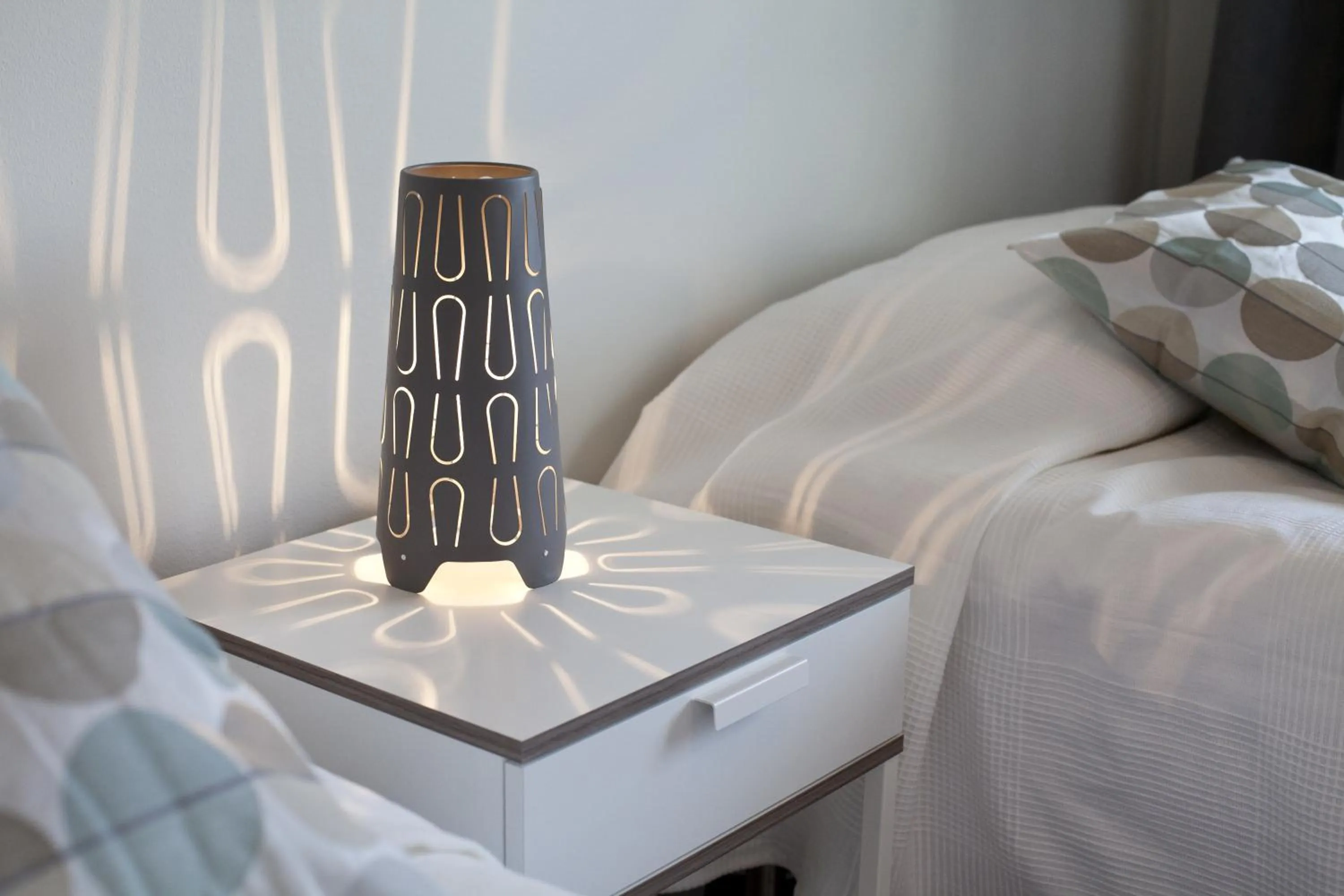 Decorative detail, Bed in Kotimaailma Apartments Rovaniemi