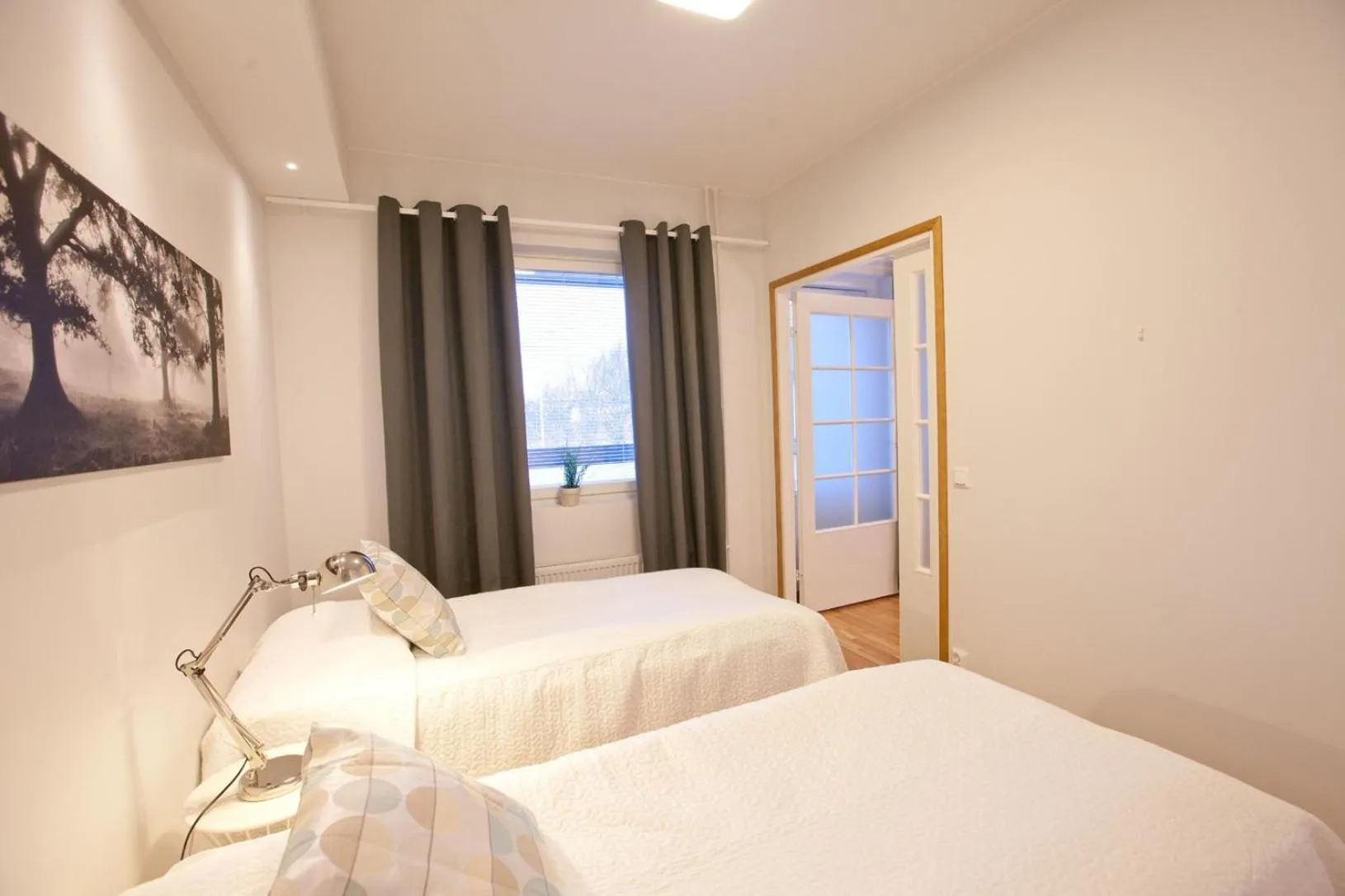 Bed in Kotimaailma Apartments Rovaniemi