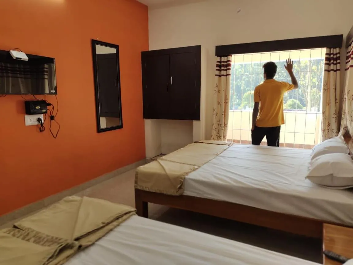 Bed in Grandwood Coco Resort Yercaud