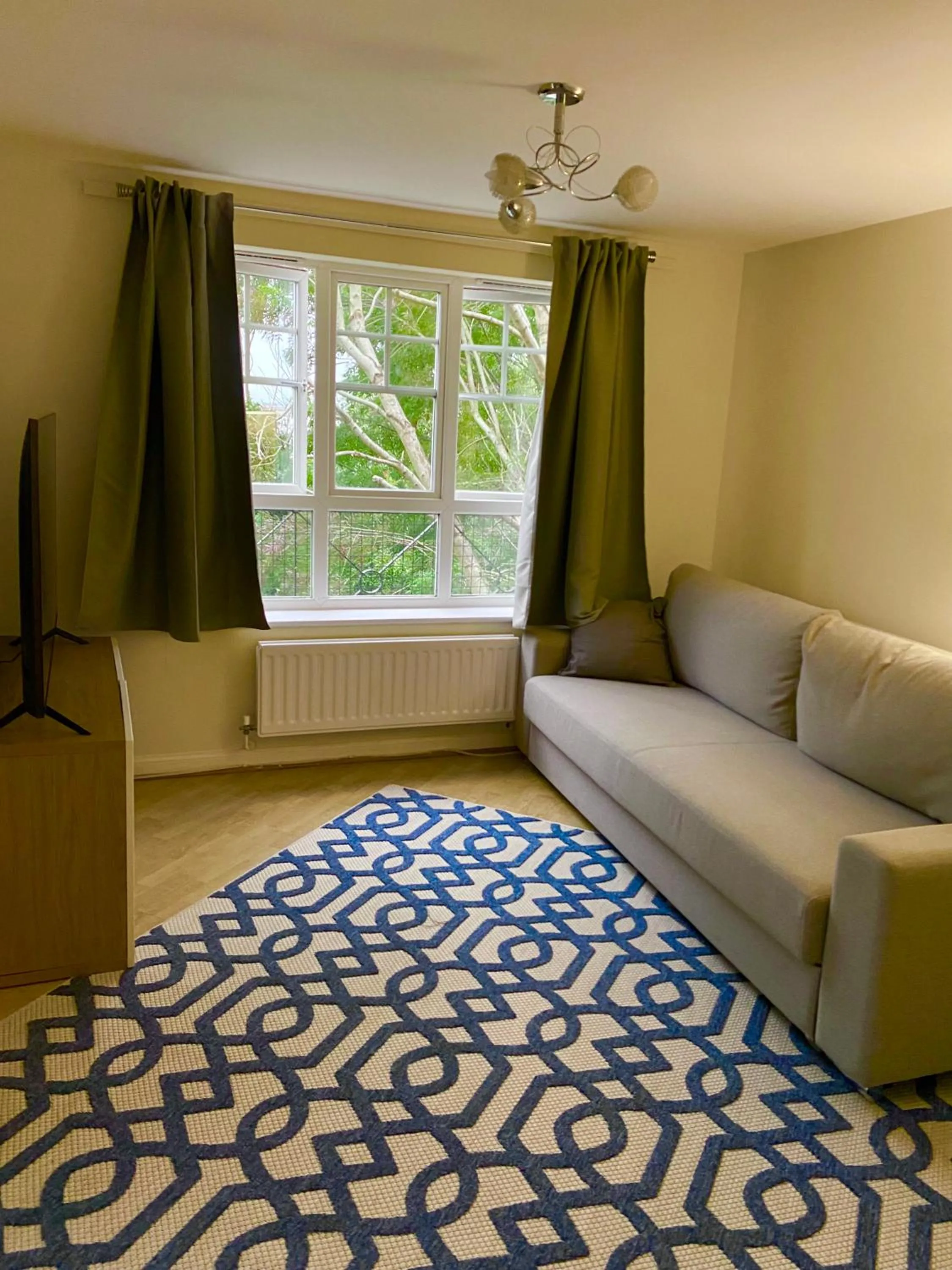 Living room, Bed in Impeccable 2-Bed Apartment in London
