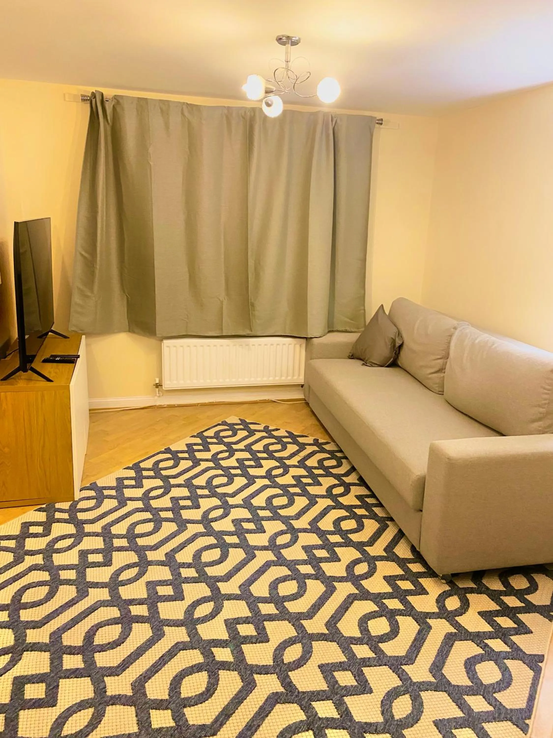 Living room, Bed in Impeccable 2-Bed Apartment in London