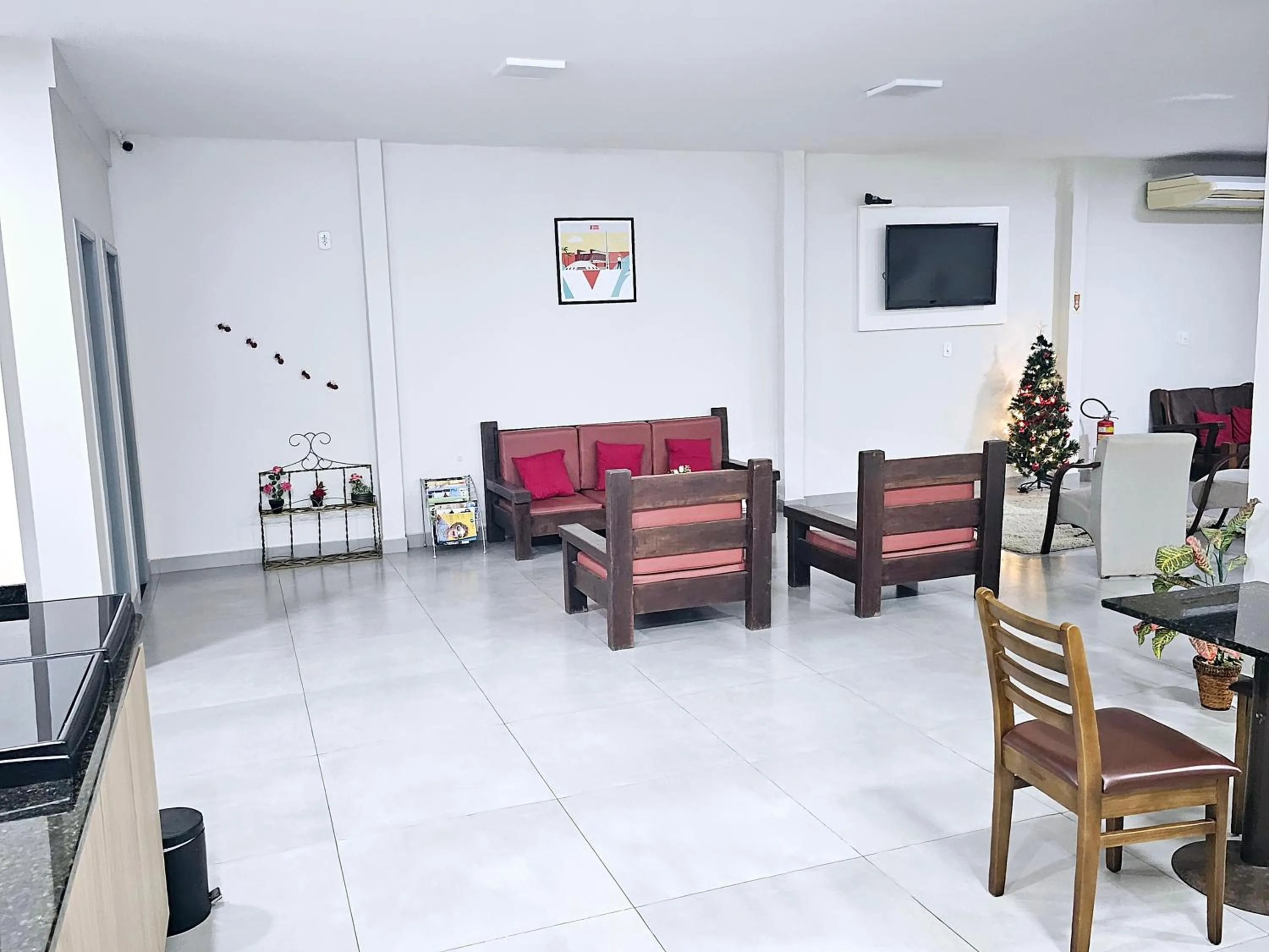 Communal lounge/ TV room in HOTEL INDIANO