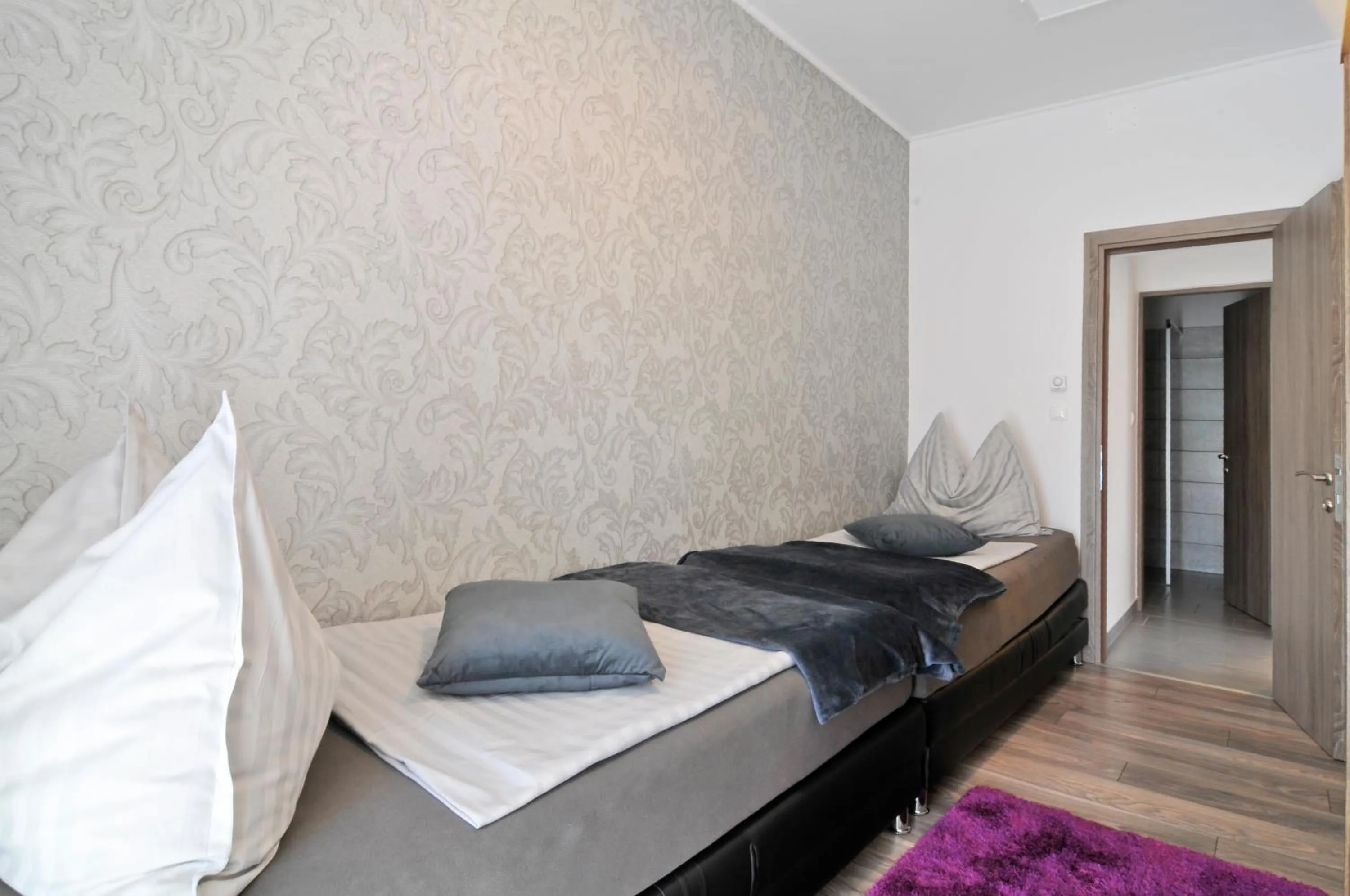 Bed in Silver Beach Apartments
