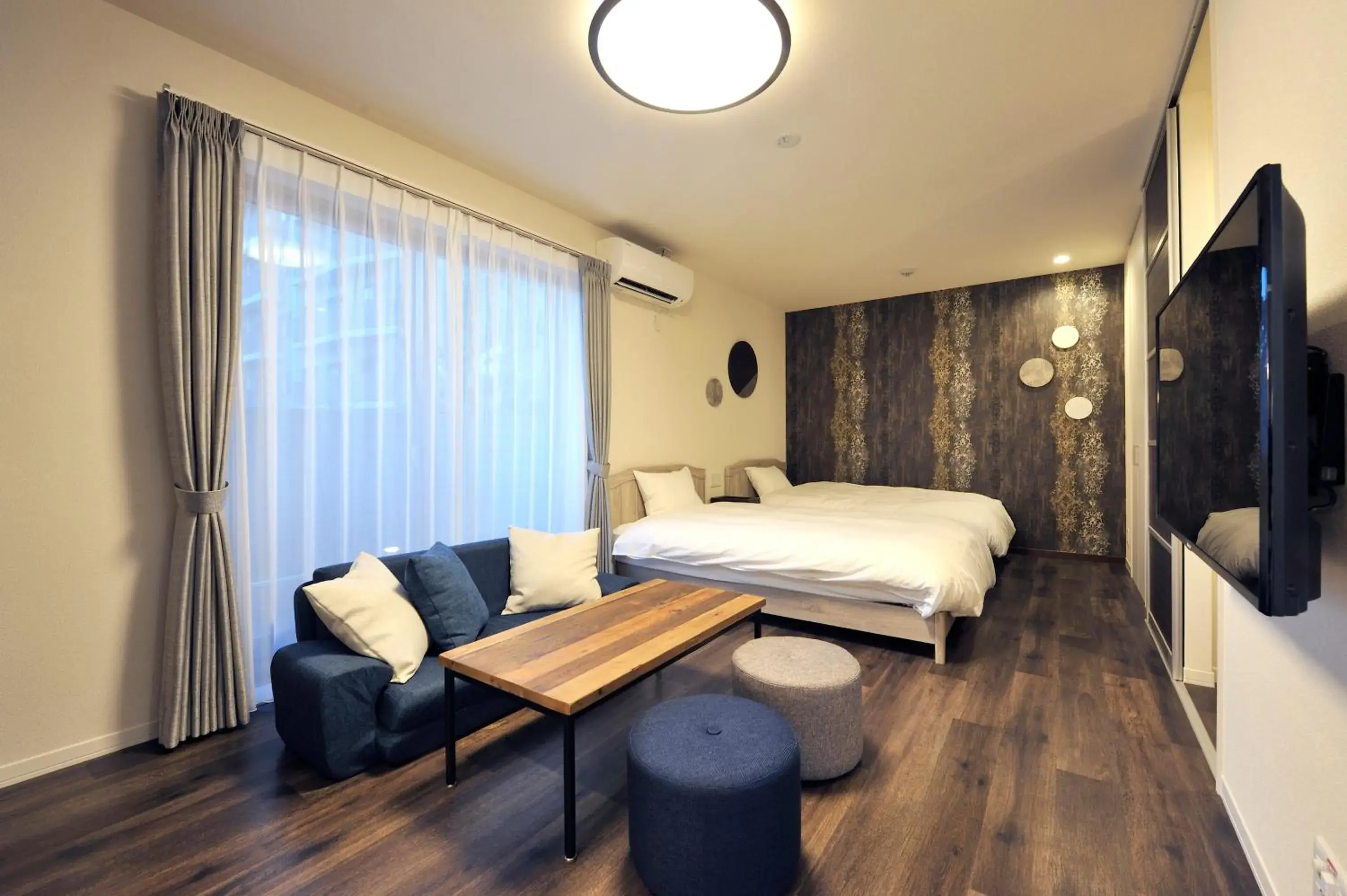 Communal lounge/ TV room, Bed in Rakuten STAY x Shamaison Osaka Dekijima Station Communal lounge/ TV room, Bed in Rakuten STAY x Shamaison Osaka Dekijima Station