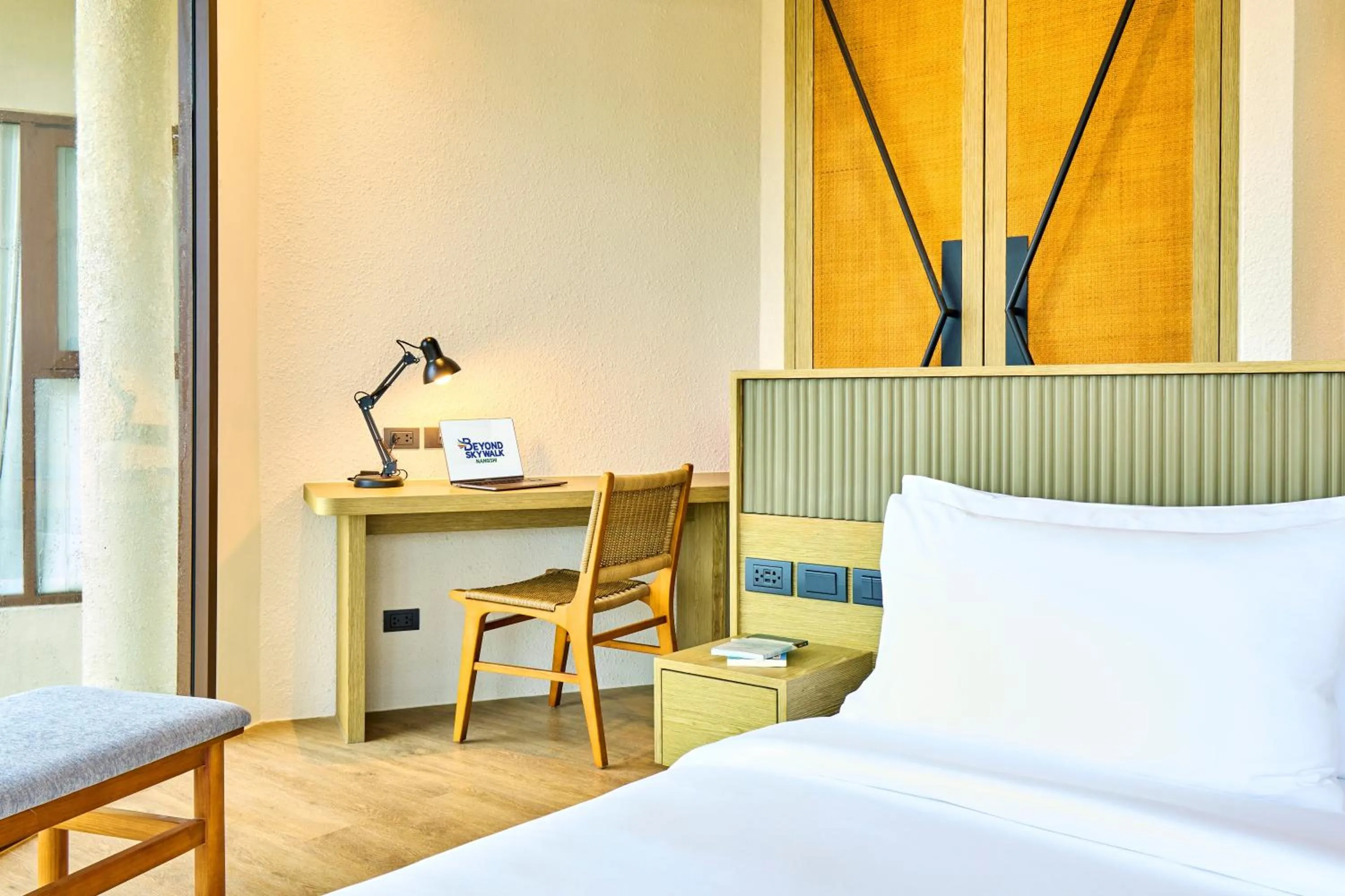 Seating area, Bed in Beyond Skywalk Nangshi