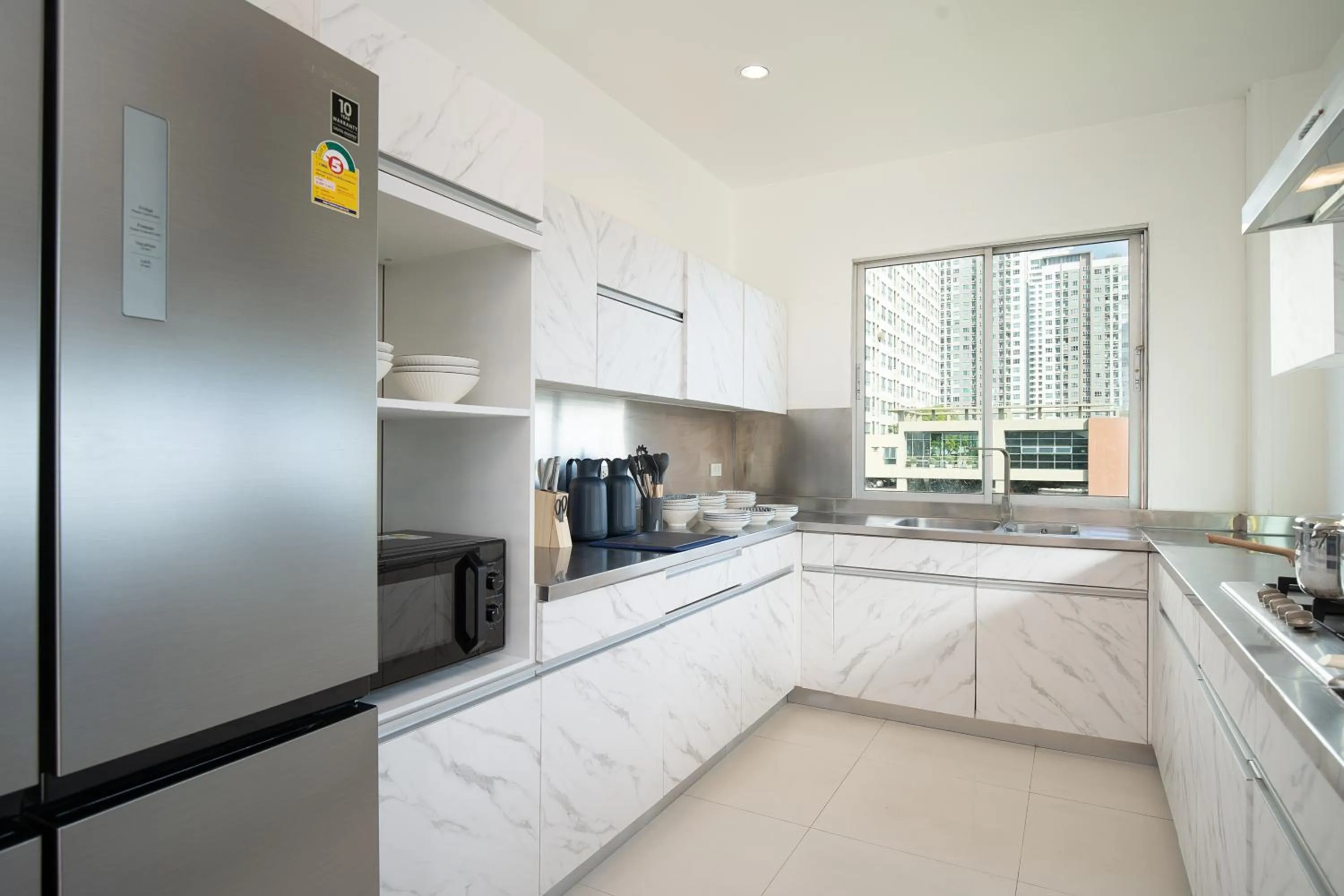 Communal kitchen in Capitel Rama 4