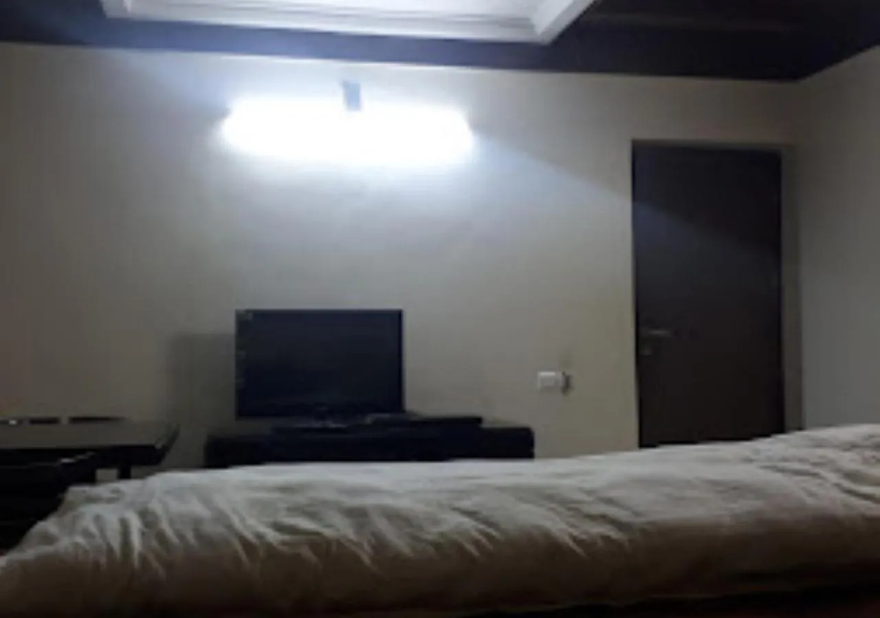 Communal lounge/ TV room, Bed in Hotel R.K.Palace Jharkhand
