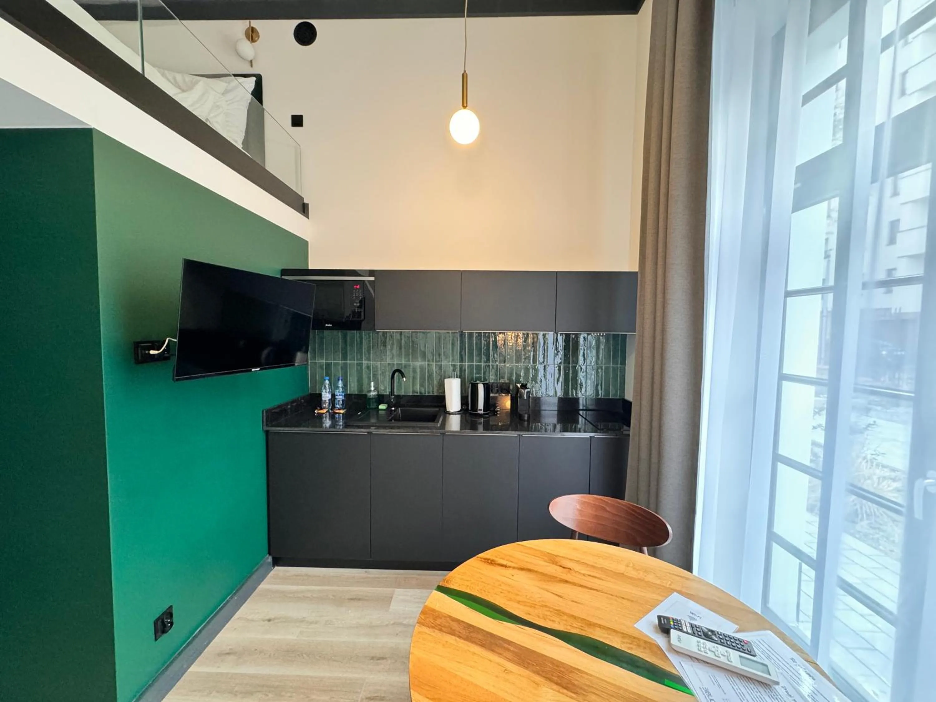 Kitchen or kitchenette in Apartamenty BIBLIO