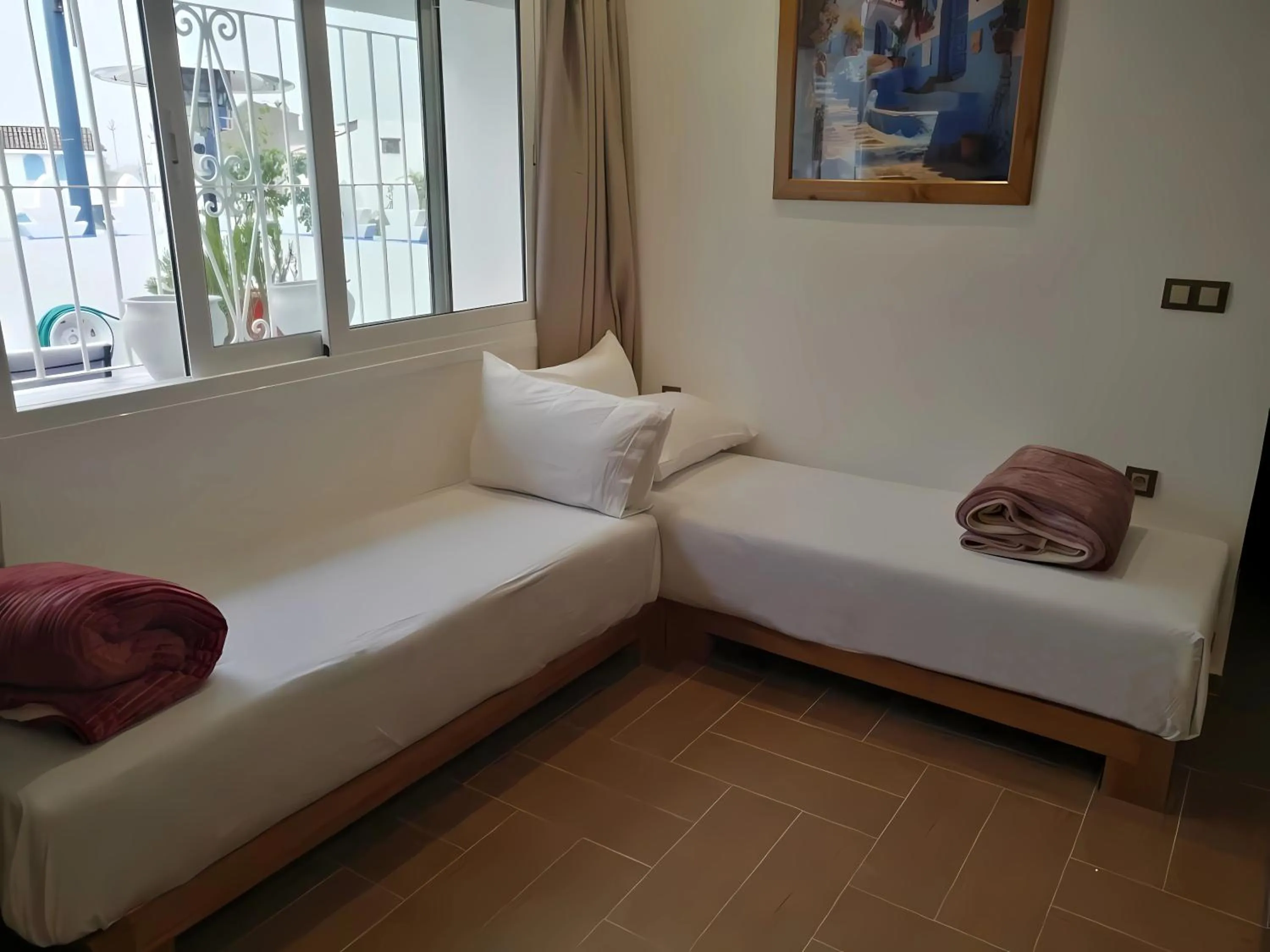 Living room, Bed in Aparthotel Dar Nowara Chaouen