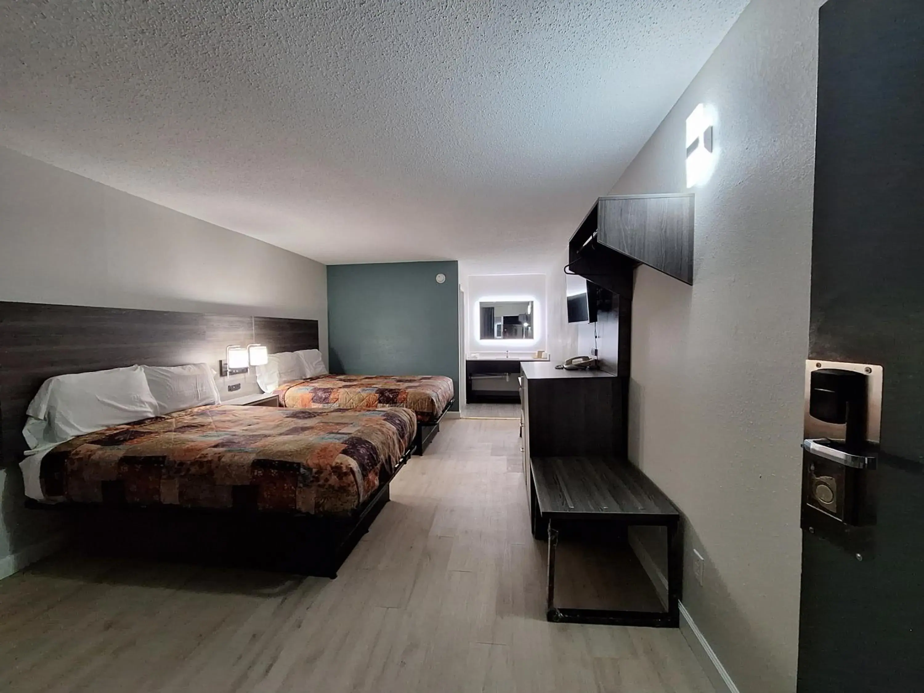 Bed in Budget Inn - Roxboro Bed in Budget Inn - Roxboro