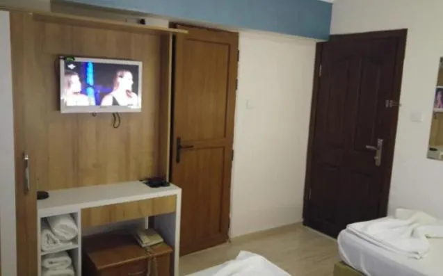 Bed in Grand Ece Hotel