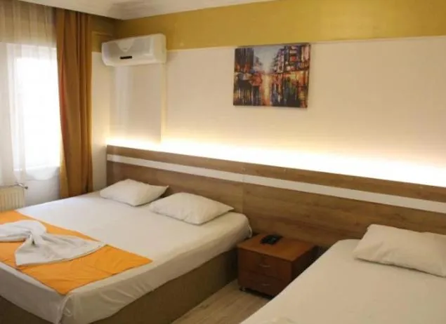 Bed in Grand Ece Hotel