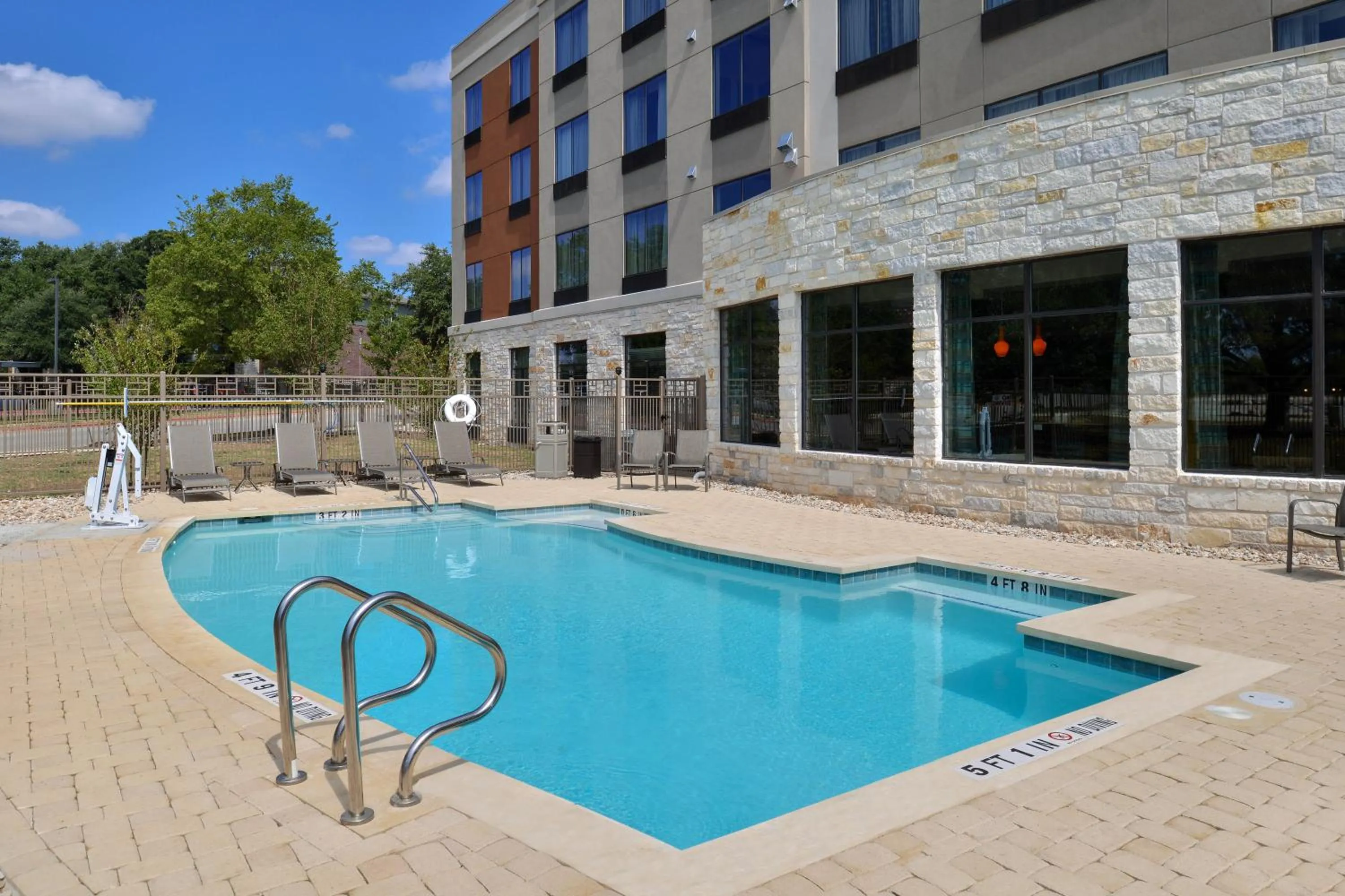 Swimming pool in Holiday Inn Express & Suites Austin South by IHG
