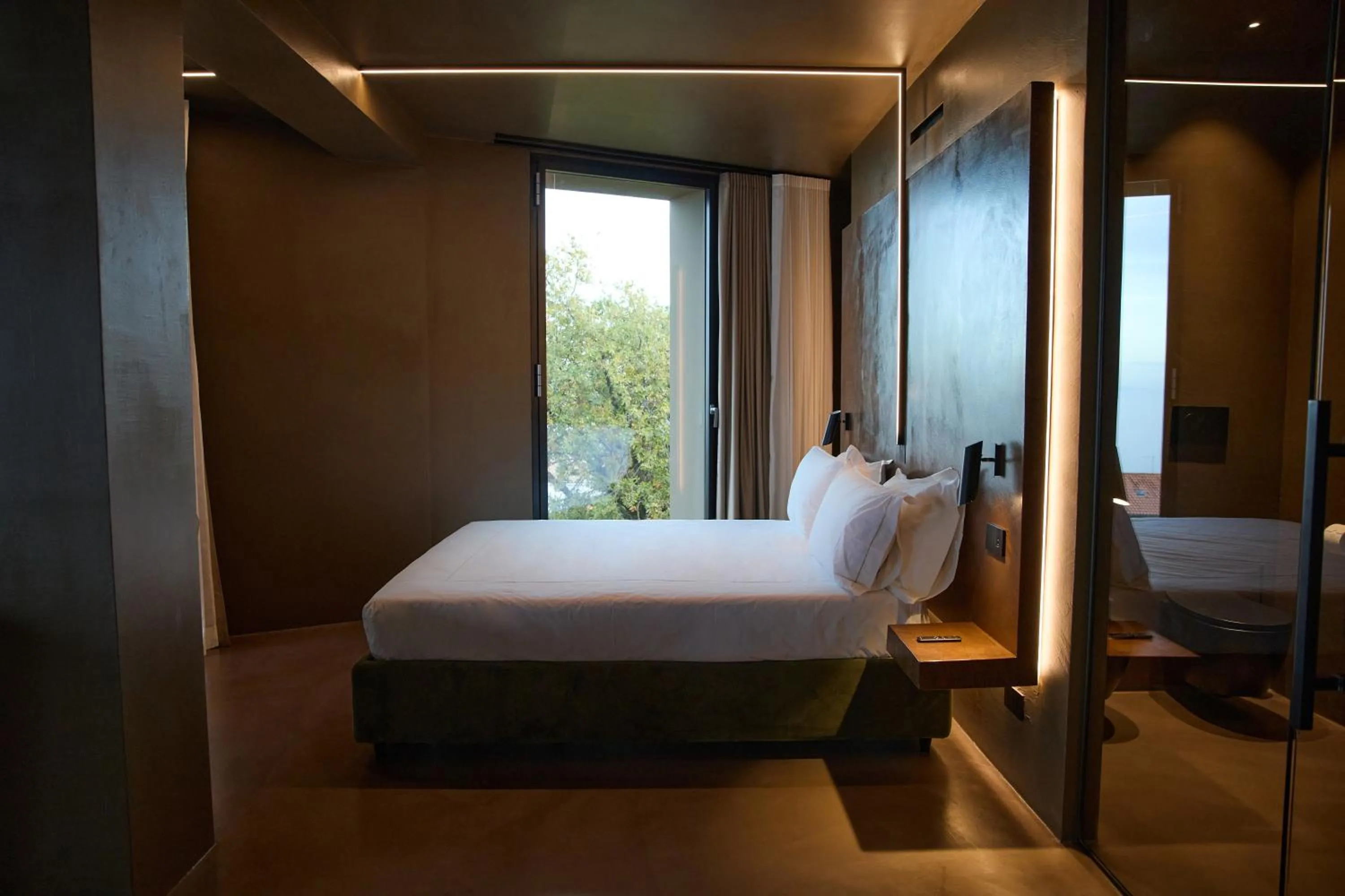 Bed in Le Agavi Resort & SPA