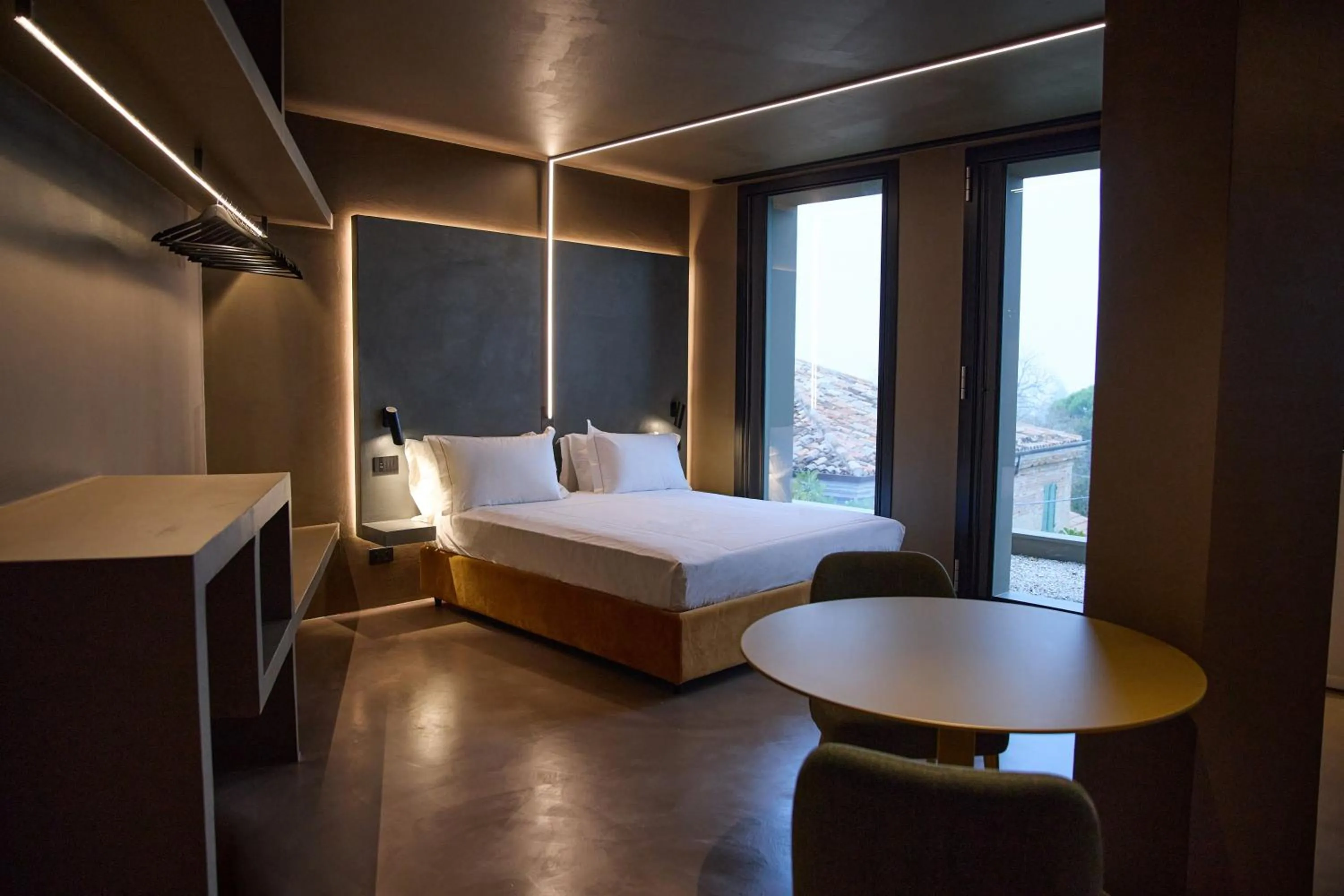 Bed in Le Agavi Resort & SPA