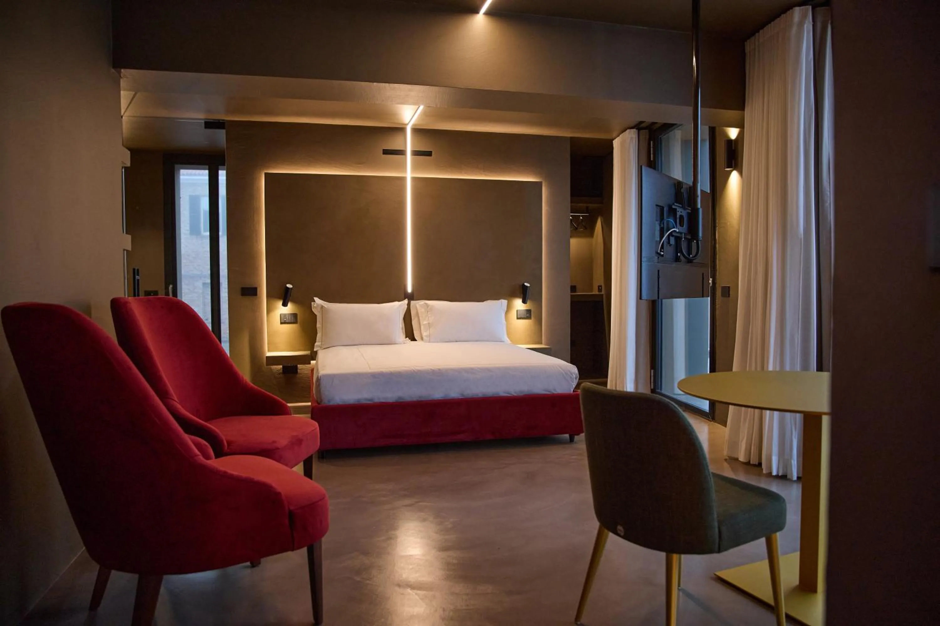 Bed in Le Agavi Resort & SPA