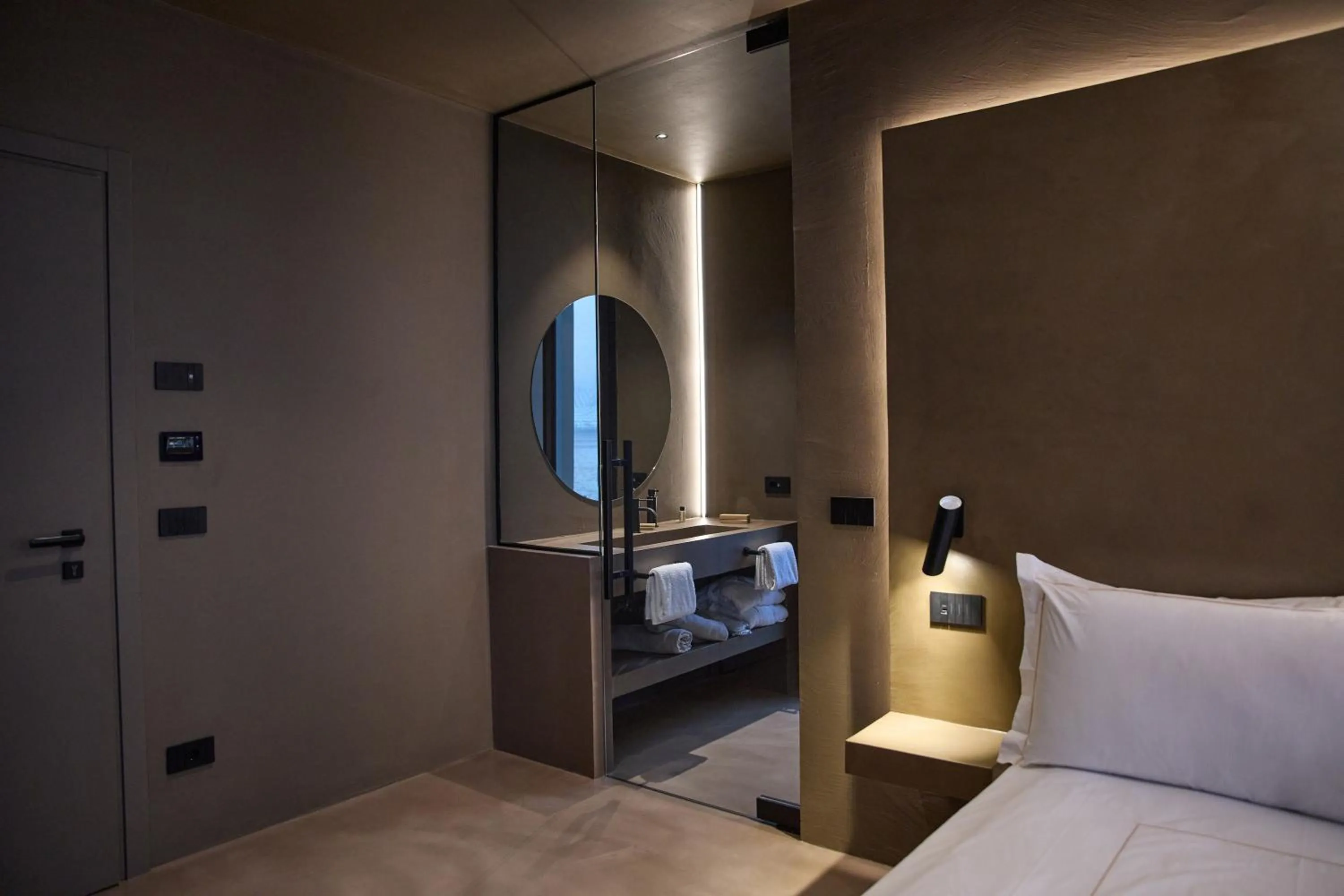 Bed in Le Agavi Resort & SPA