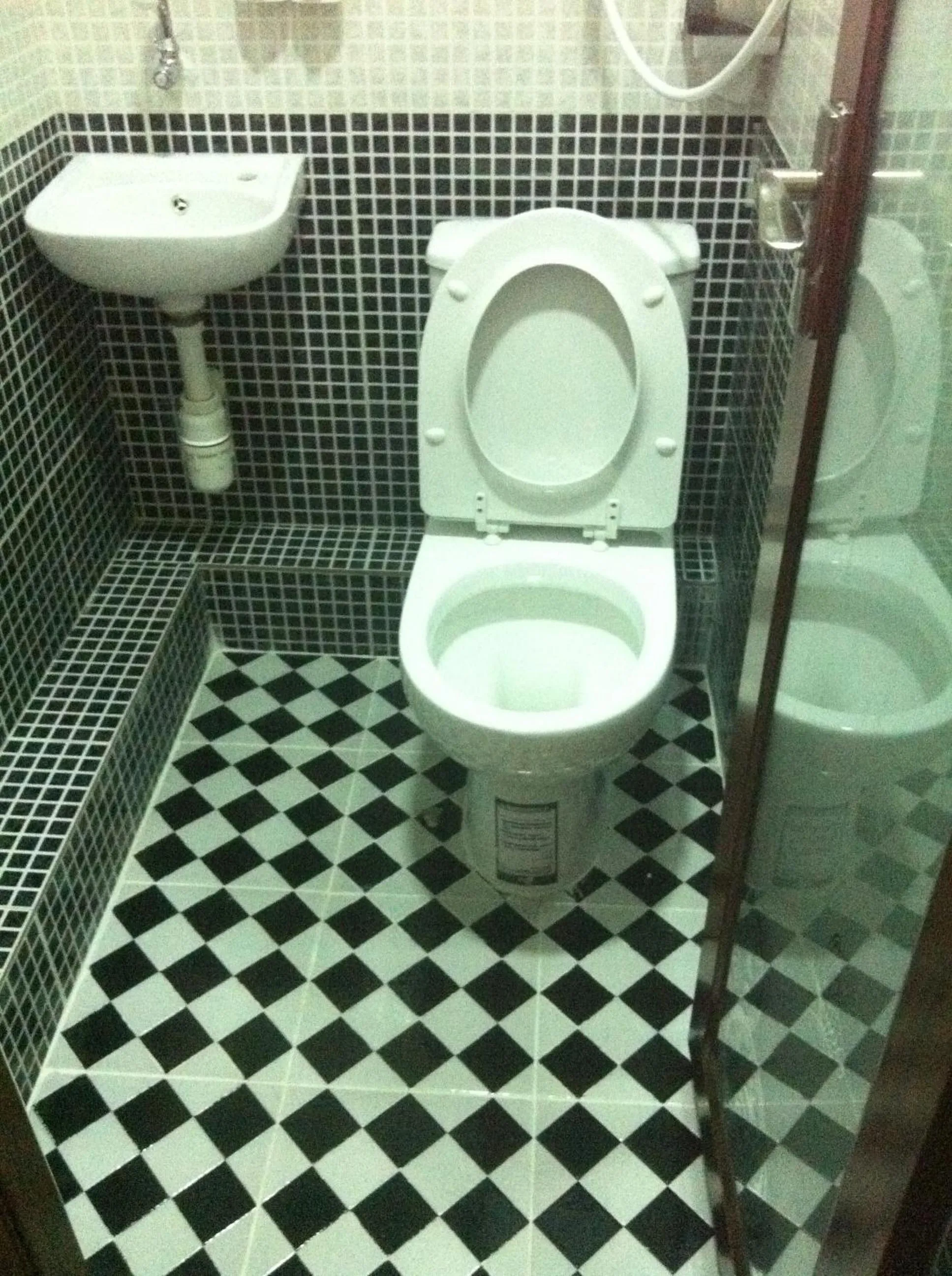 Bathroom in New Cosmos Hotel