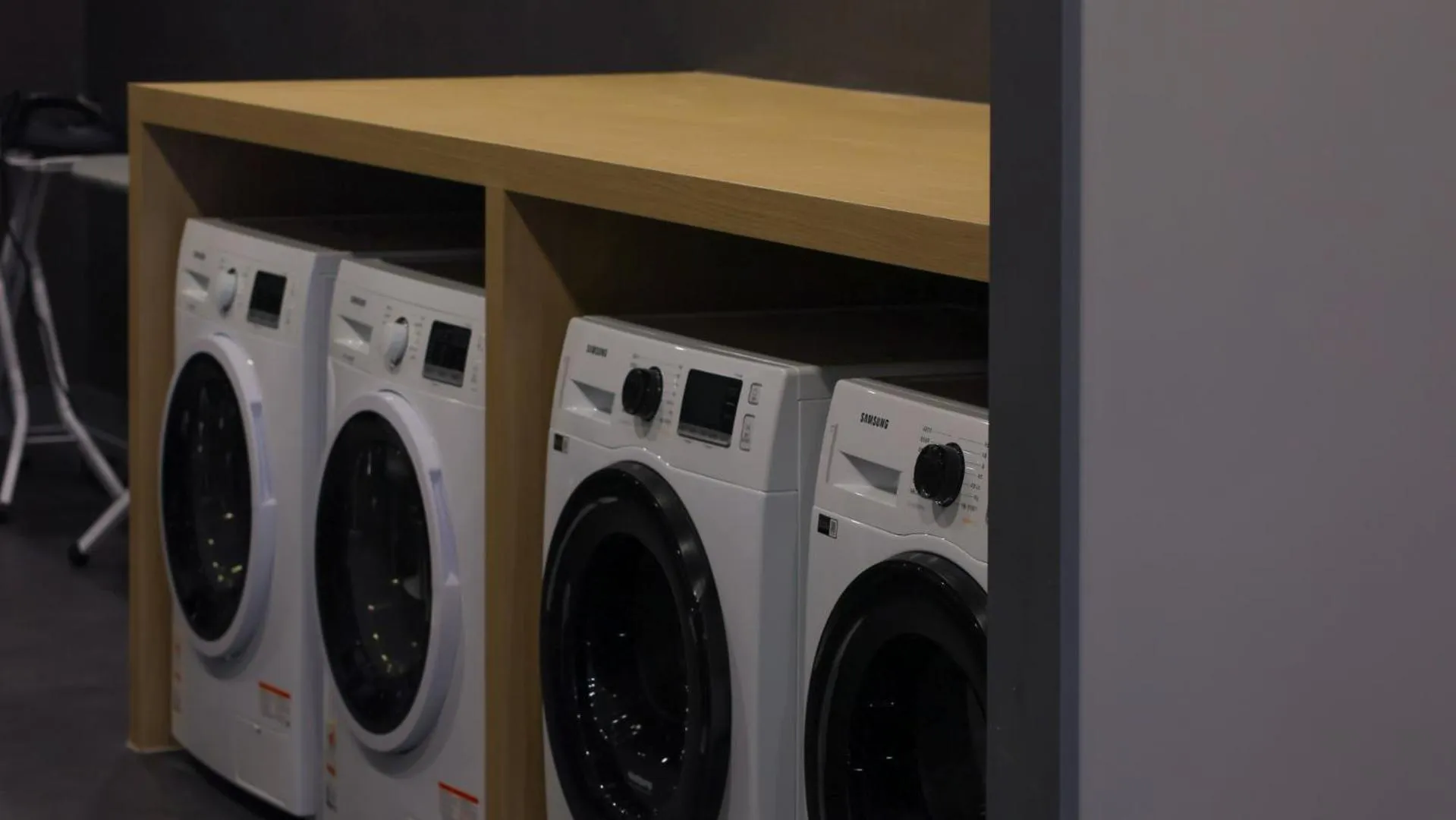 washing machine in Workers Hotel Daejeon by Aank