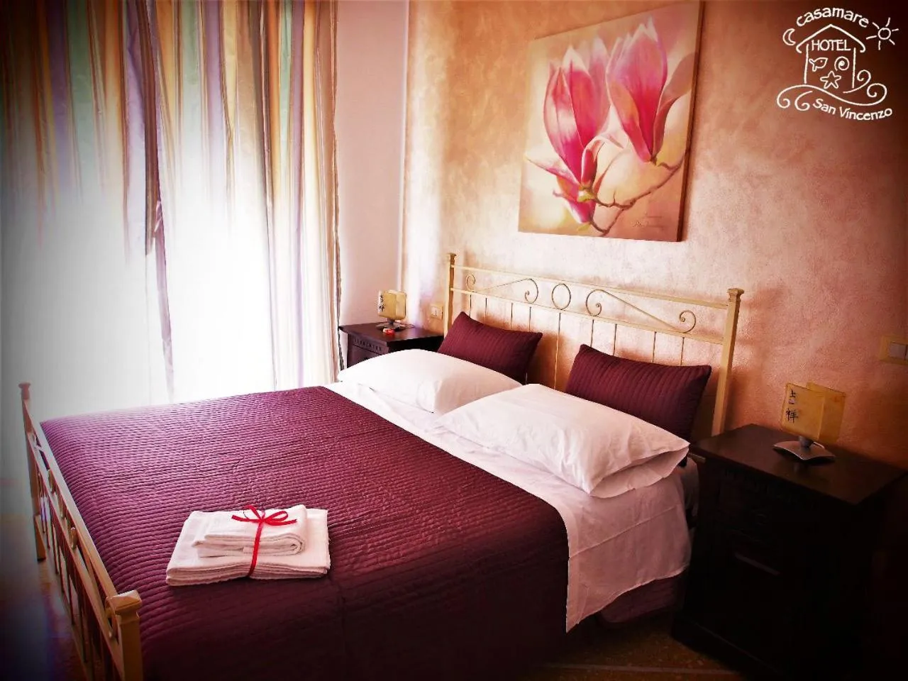 Bed in Casamare Hotel