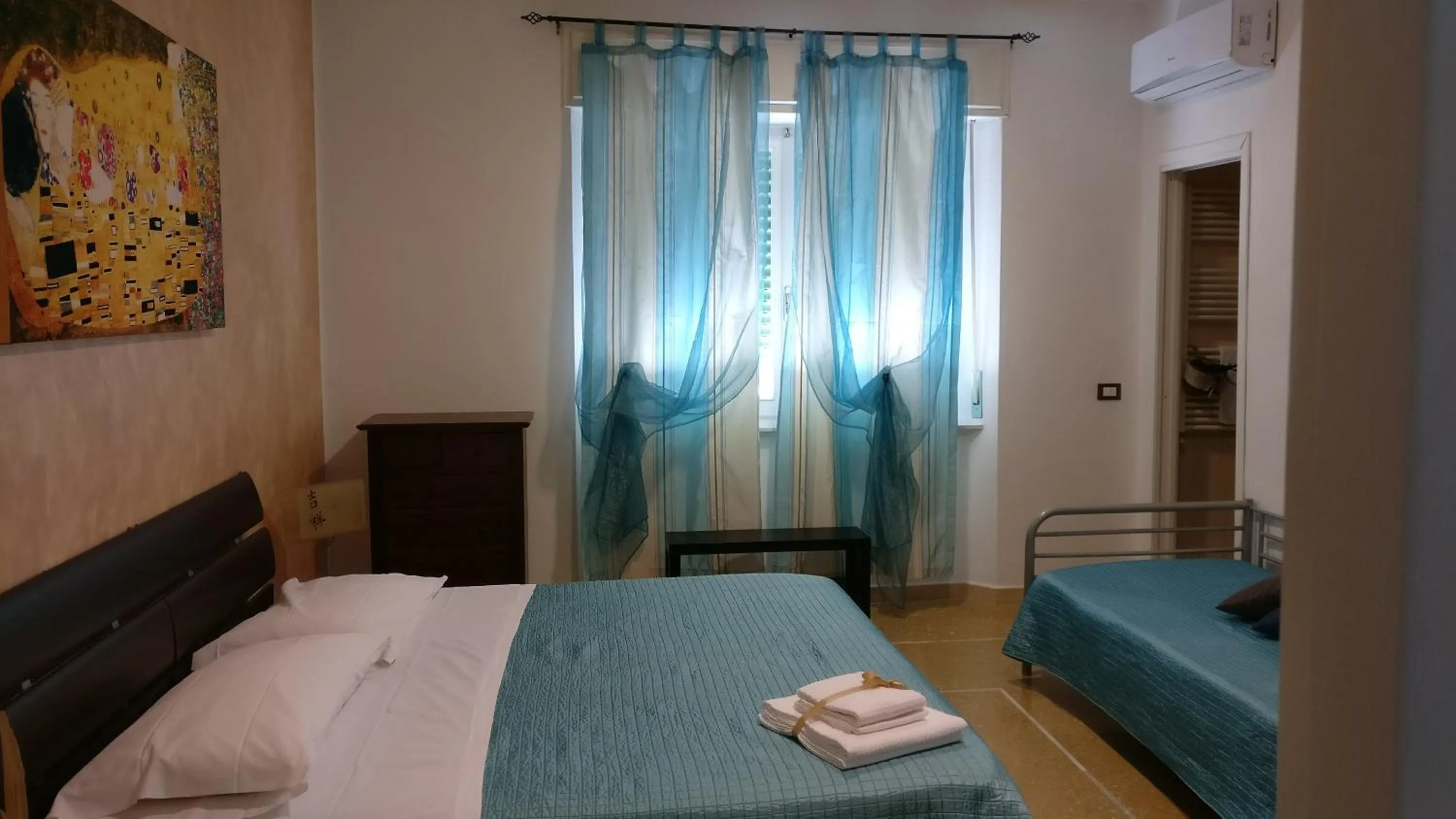 Bed in Casamare Hotel