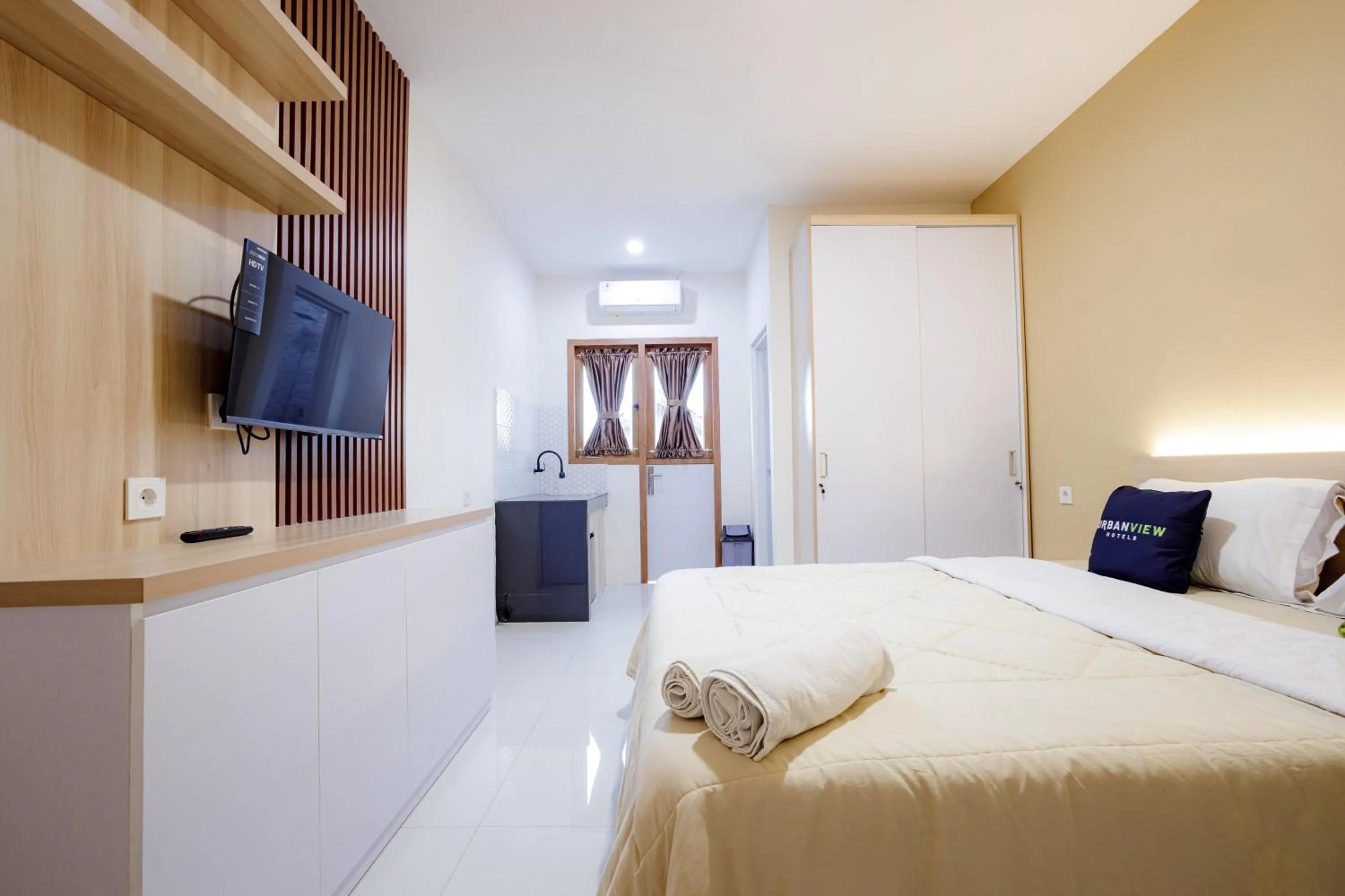 Bedroom, Bed in Urbanview Hotel Syariah The Ragunan Residence