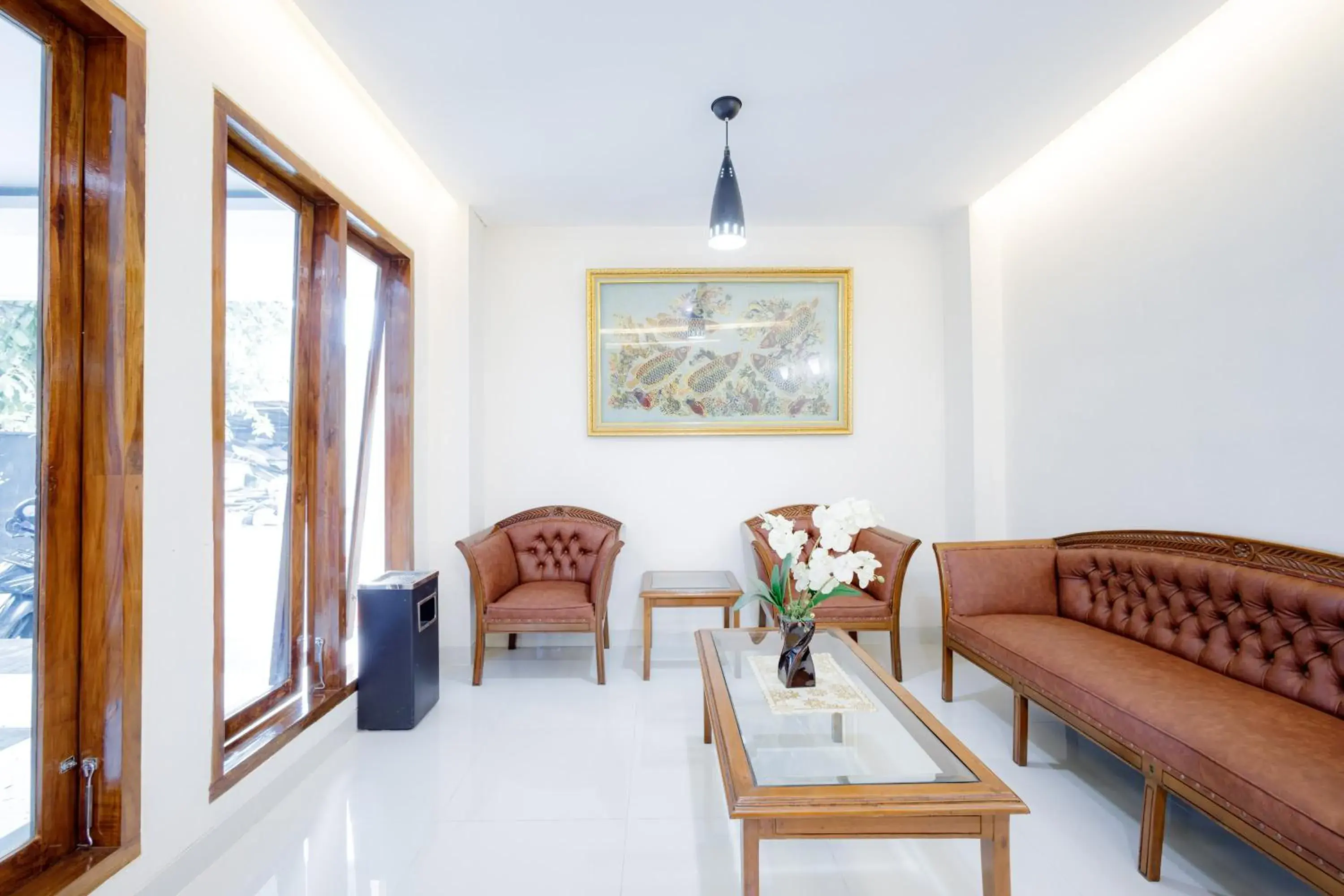 Living room in Urbanview Hotel Syariah The Ragunan Residence Living room in Urbanview Hotel Syariah The Ragunan Residence