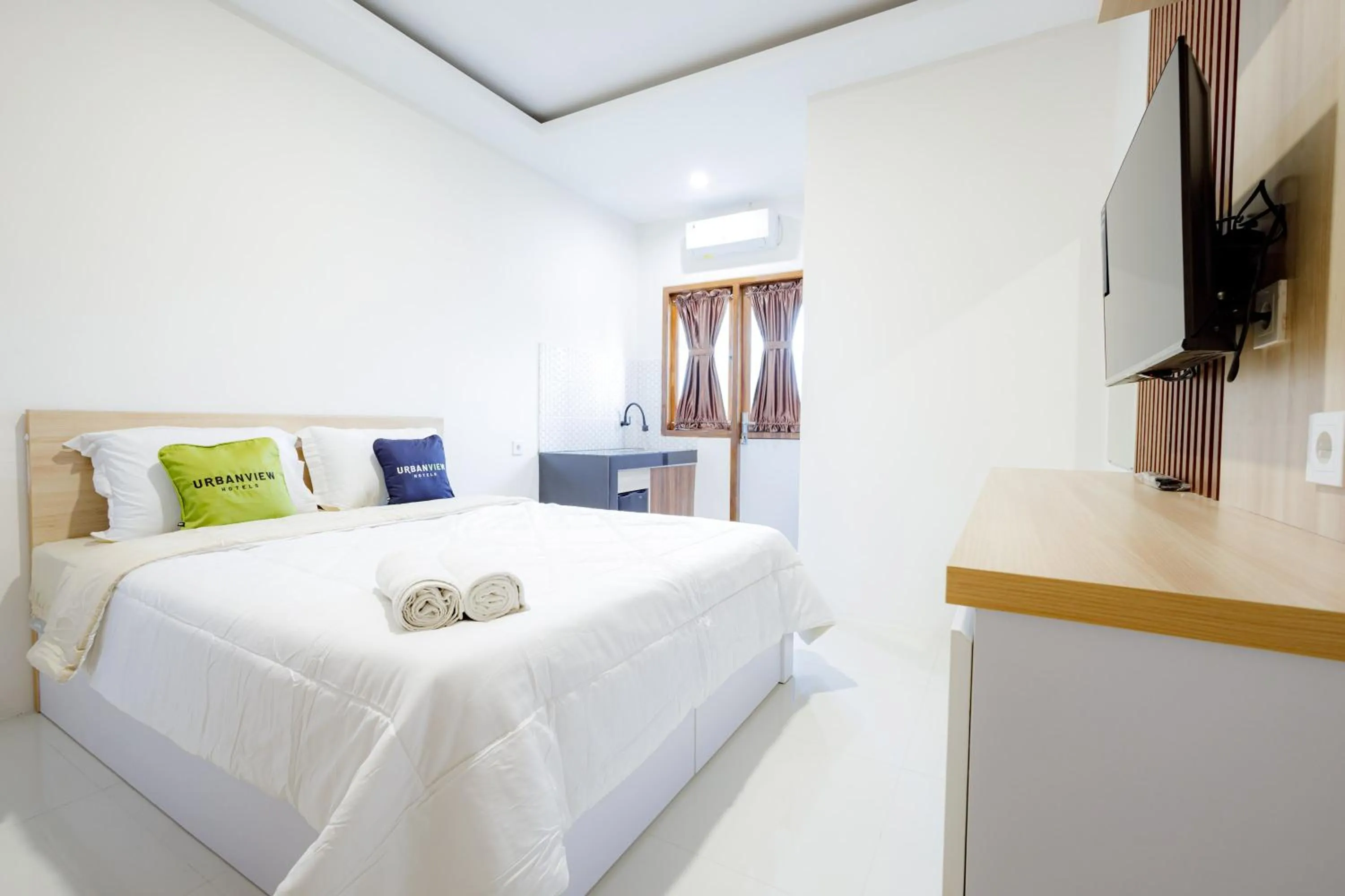 Bedroom, Bed in Urbanview Hotel Syariah The Ragunan Residence