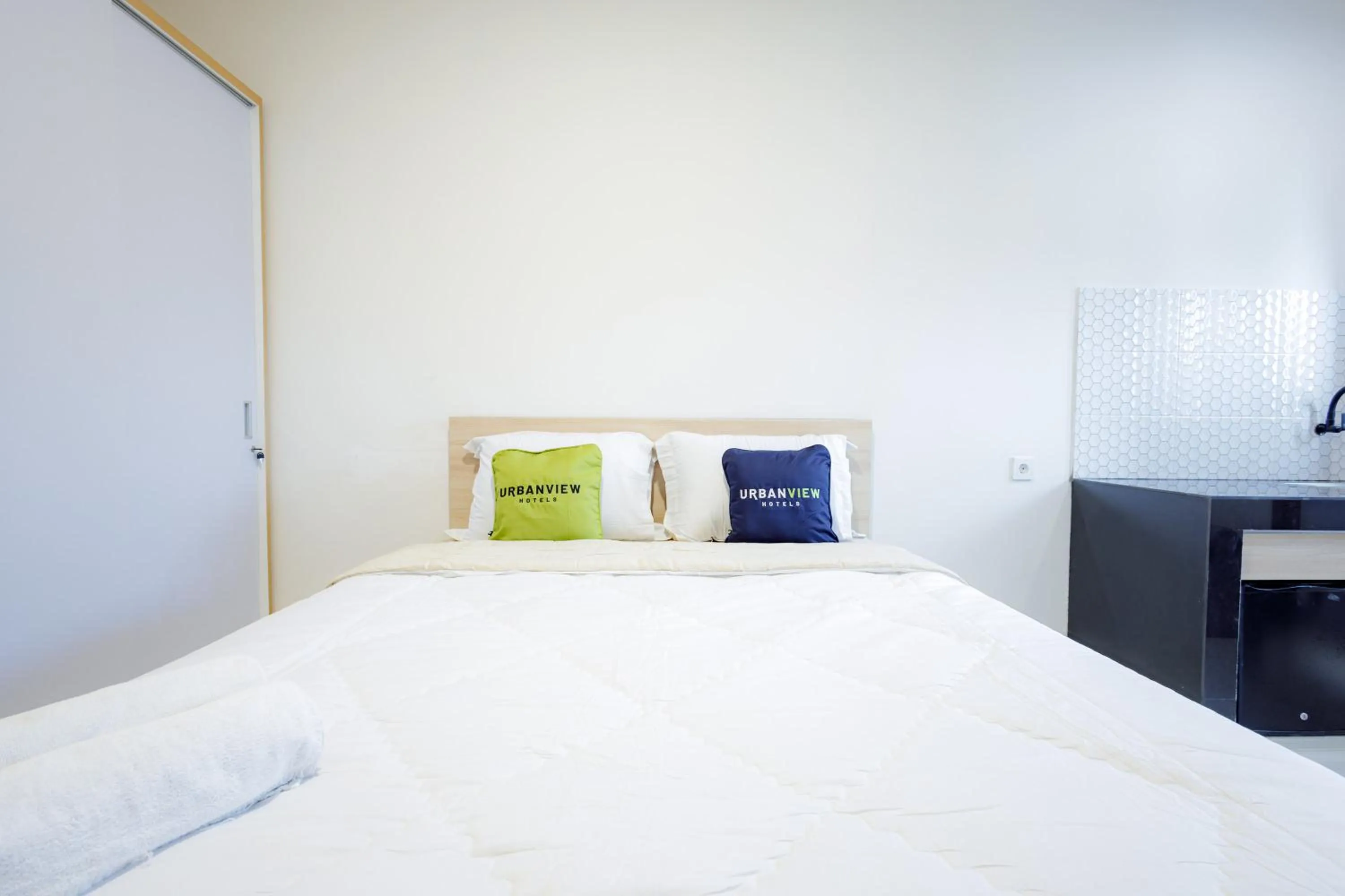 Bedroom, Bed in Urbanview Hotel Syariah The Ragunan Residence