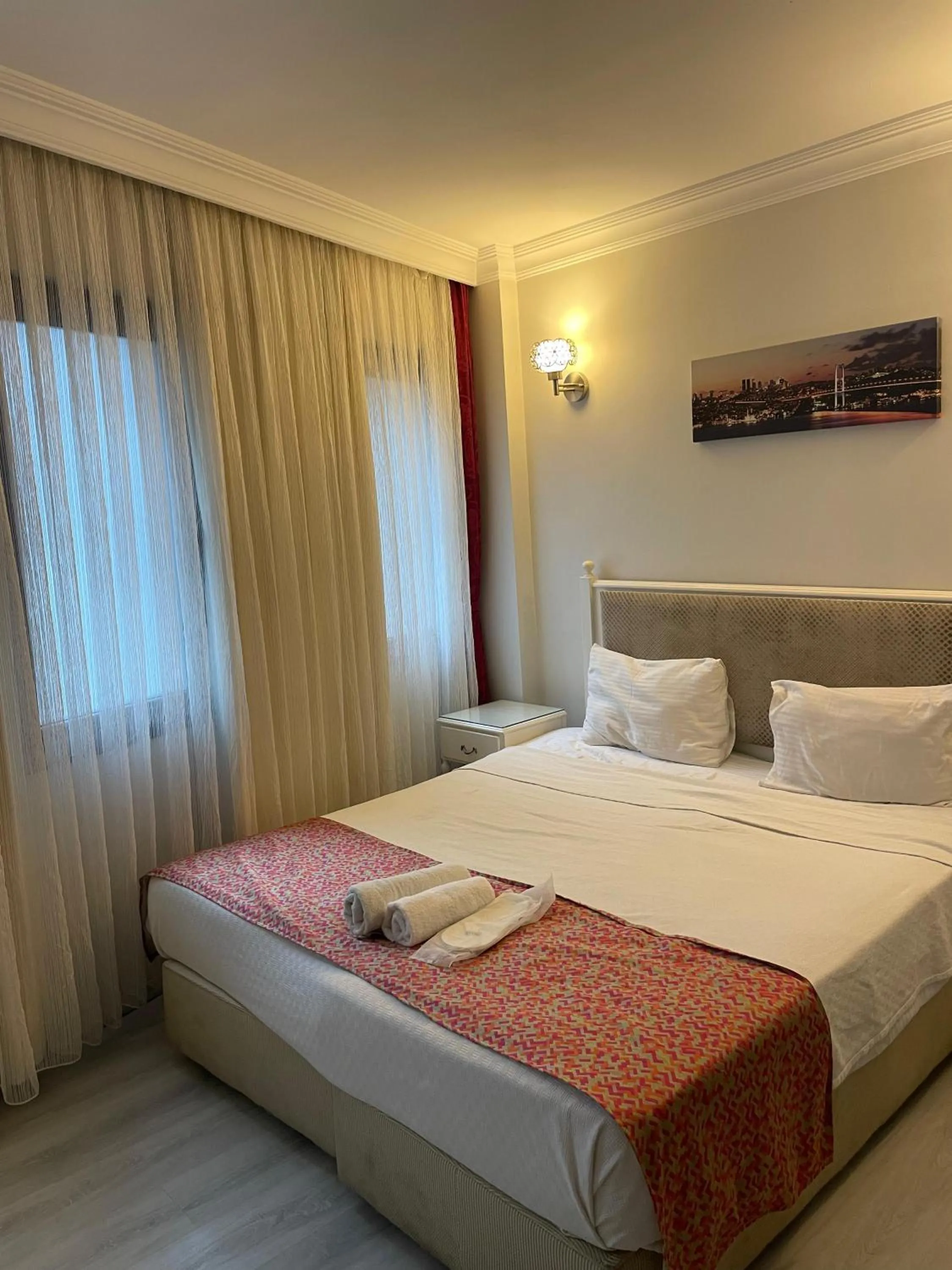 Bed in NACRE RESIDENCE