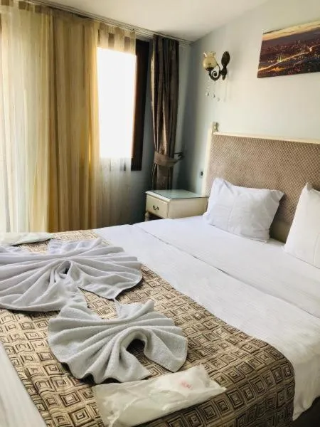 Bed in NACRE RESIDENCE