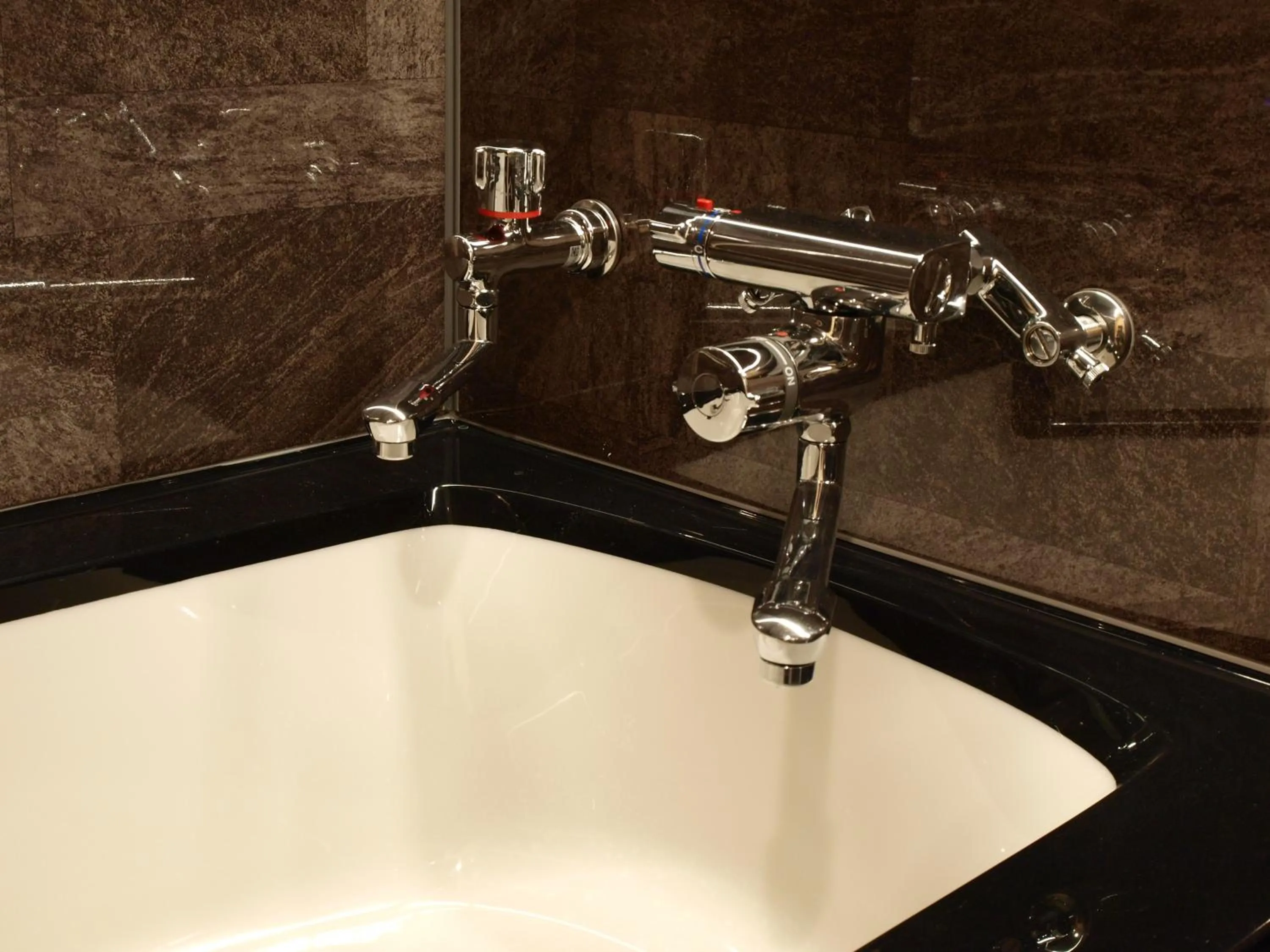 Bathroom in Niseko Hot Spring Ikoino Yuyado Iroha