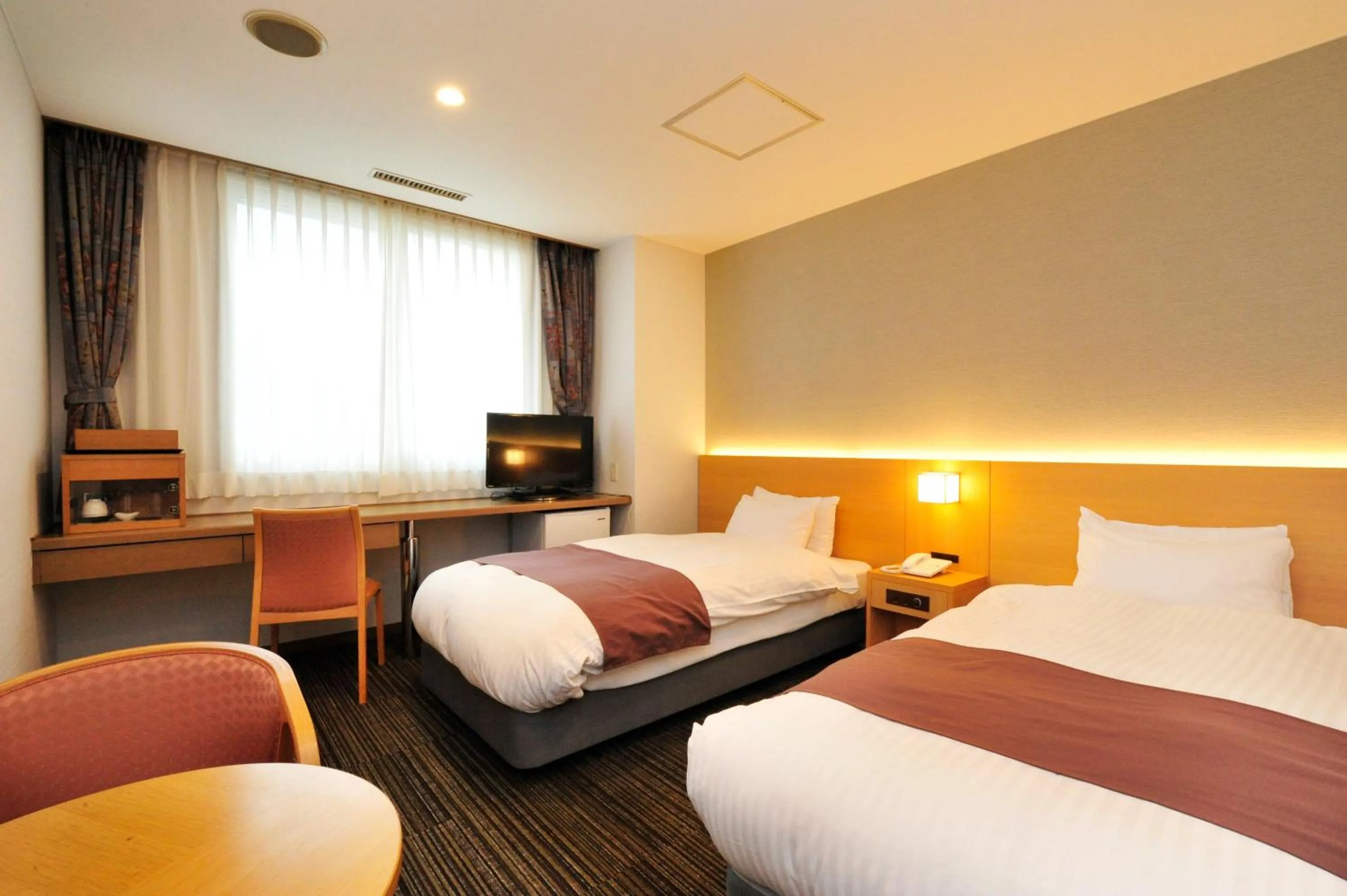 Photo of the whole room, Bed in Niseko Hot Spring Ikoino Yuyado Iroha