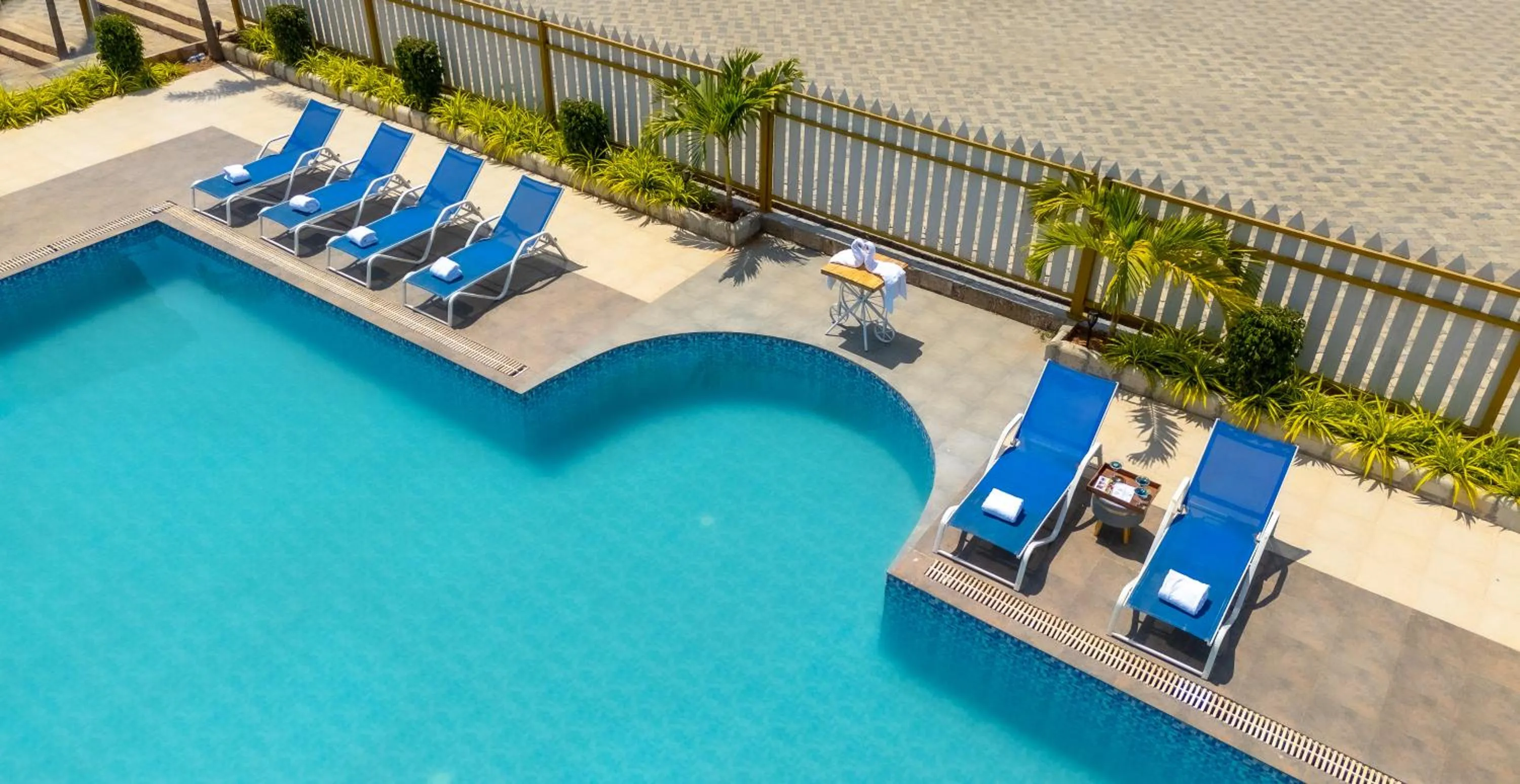 Swimming pool in Daksh Eden Greenz -A Luxury Resort in Sasan Gir